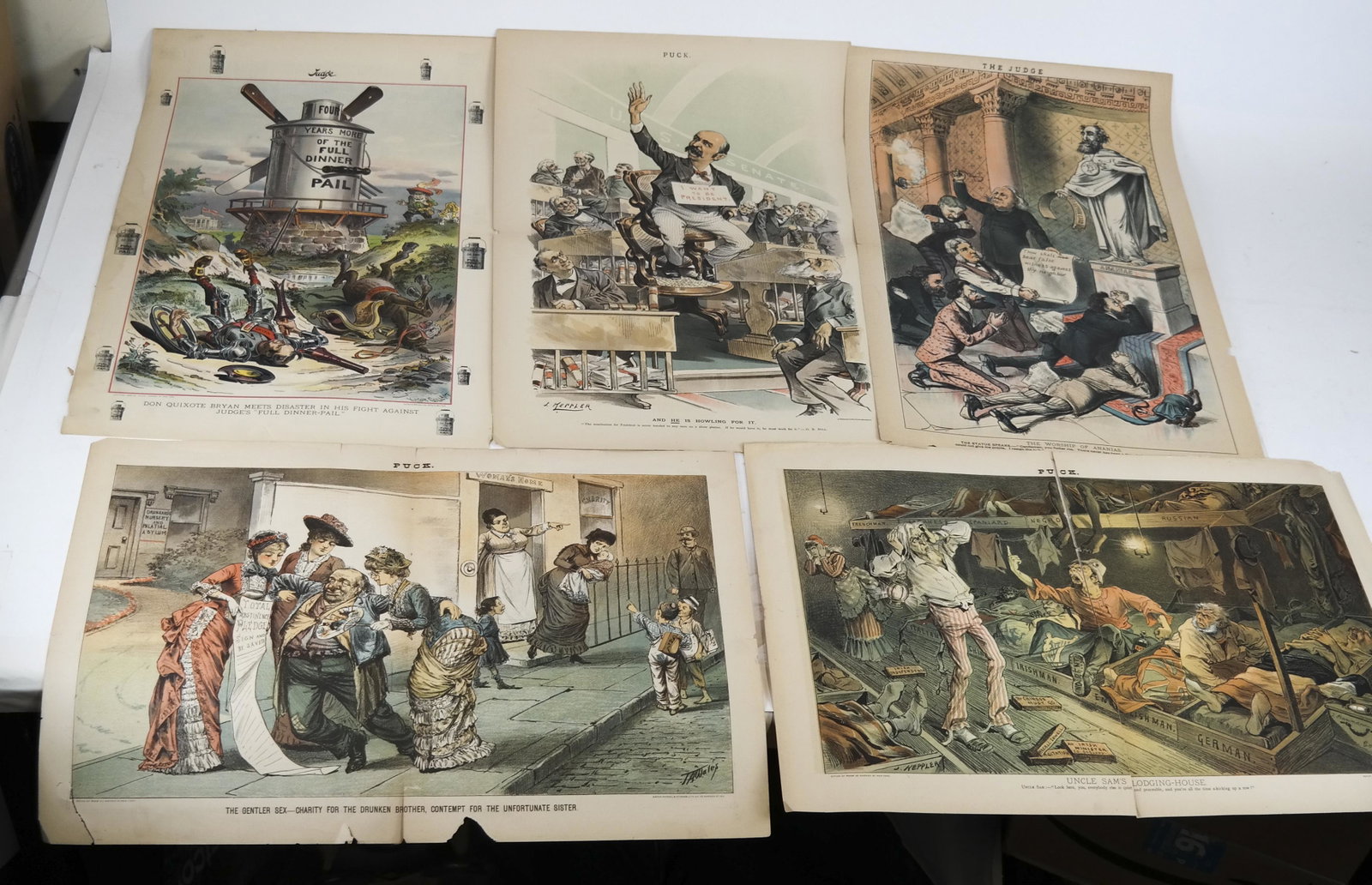 PUCK, JUDGE: Group of 9 Political Cartoons: 1. An ever-popular game - checking at tough old Uncle Jim; 2. The balloon in distress; 3. And he is howling for it; 4. Judge: Don Quixote brain; 5. Judge: The worship of Ananias; 6. Puck: Building the
