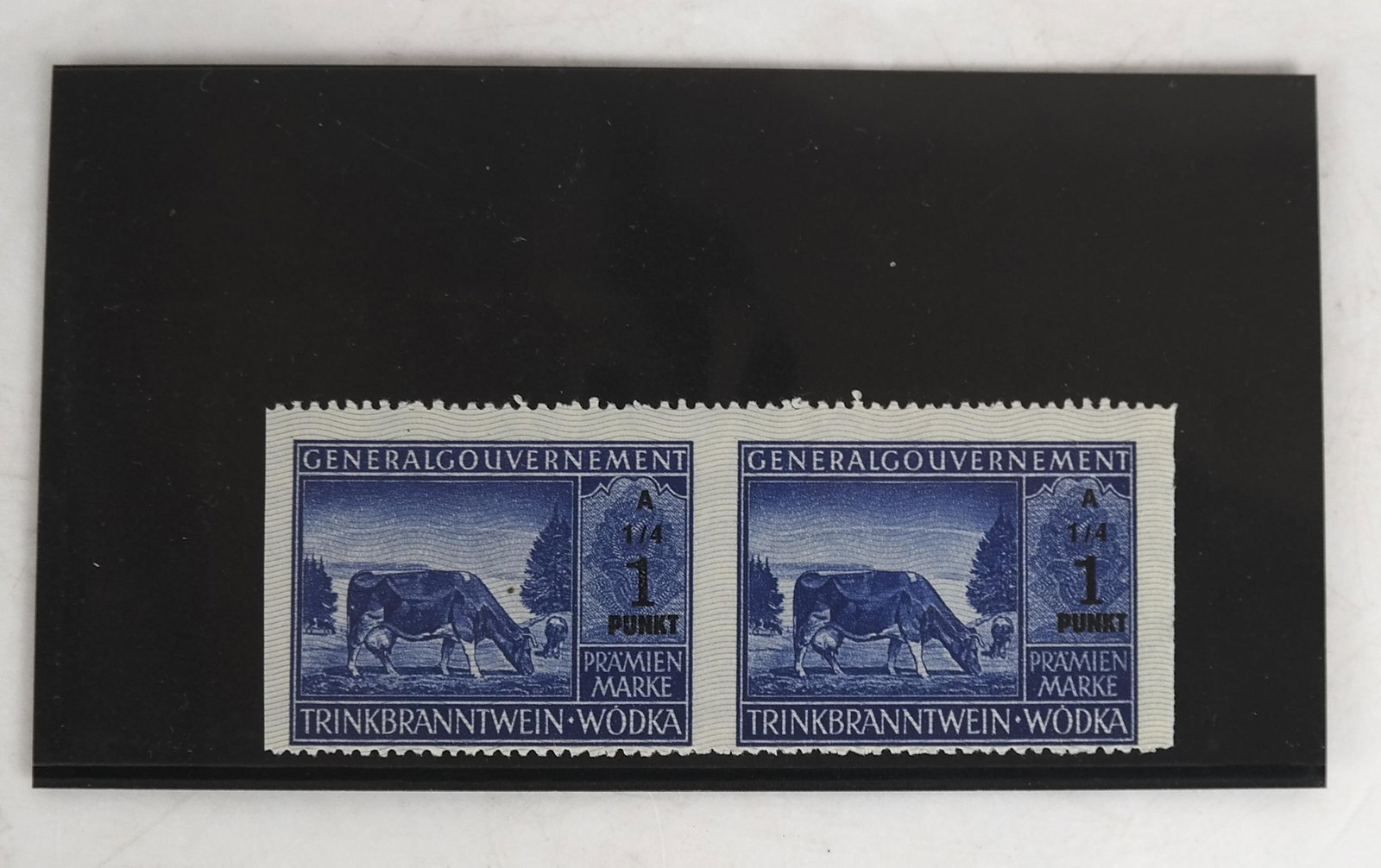German Occ. Poland WWII Wine Vodka Error Strips: Horizontal pair of the 1 Punkt series A 1/4, imperforate vertically. Provenance: Dr. Alan York Estate. Unused without gum, as issued; very fine.