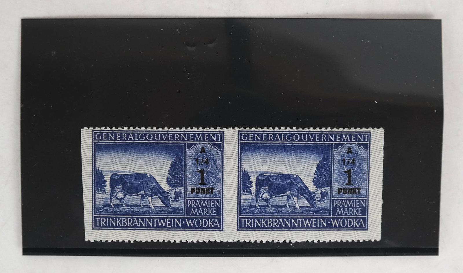 German Occ. Poland WWII Wine Vodka Error Strips: Horizontal pair of the 1 Punkt series A 1/4, imperforate vertically. Provenance: Dr. Alan York Estate. Unused without gum, as issued; very fine.