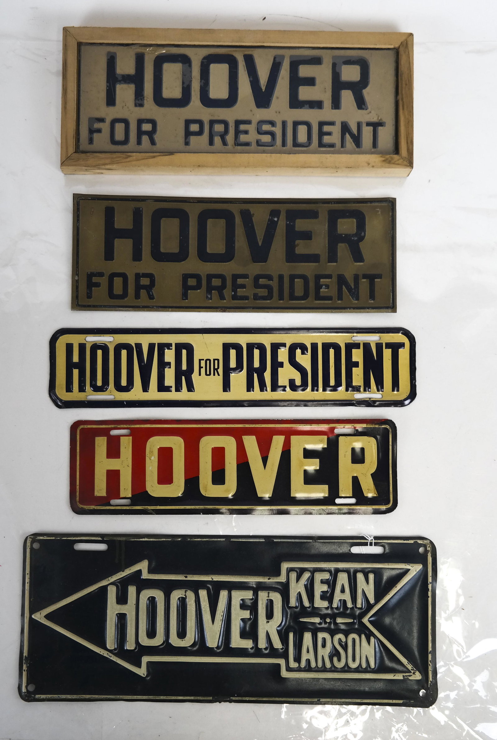 Hoover License Plate Tag Group: 4 tags, including one unwrapped Hoover for President with another, red, white & blue Hoover, and a Hoover, Kean, Larson in an arrow. [ Largest: 15 x 6 inches].