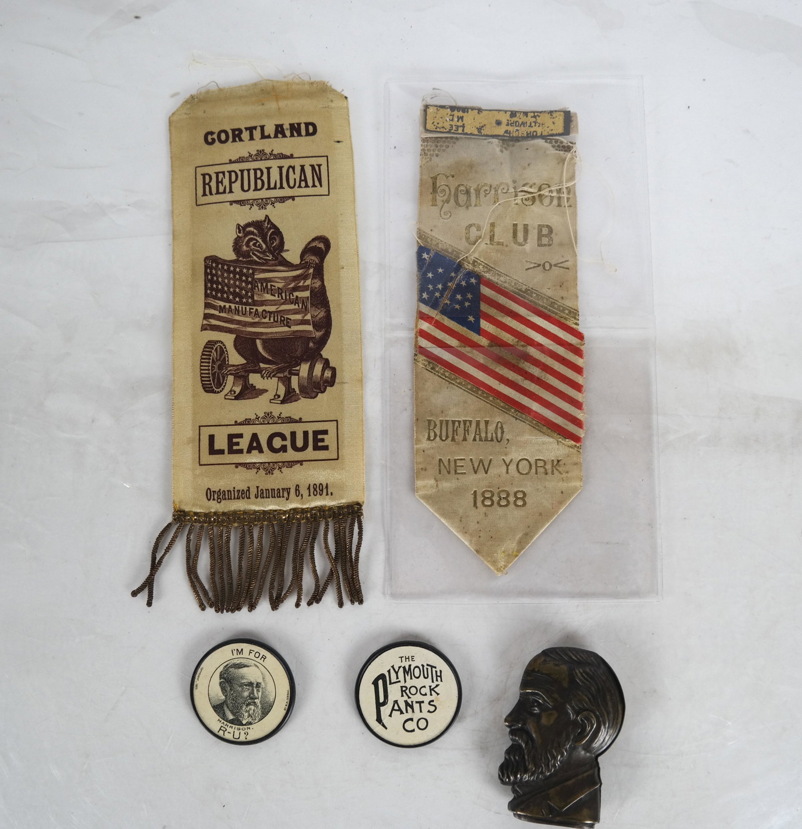 Benjamin Harrison Ribbons, More: 1. Harrison Club, Buffalo New York, 1888 ribbon with American Flag motif. 2. Cortland Republican League "American Manufacture" League Organized January 6, 1891 ribbon, featuring a raccoon. 3. Two ther