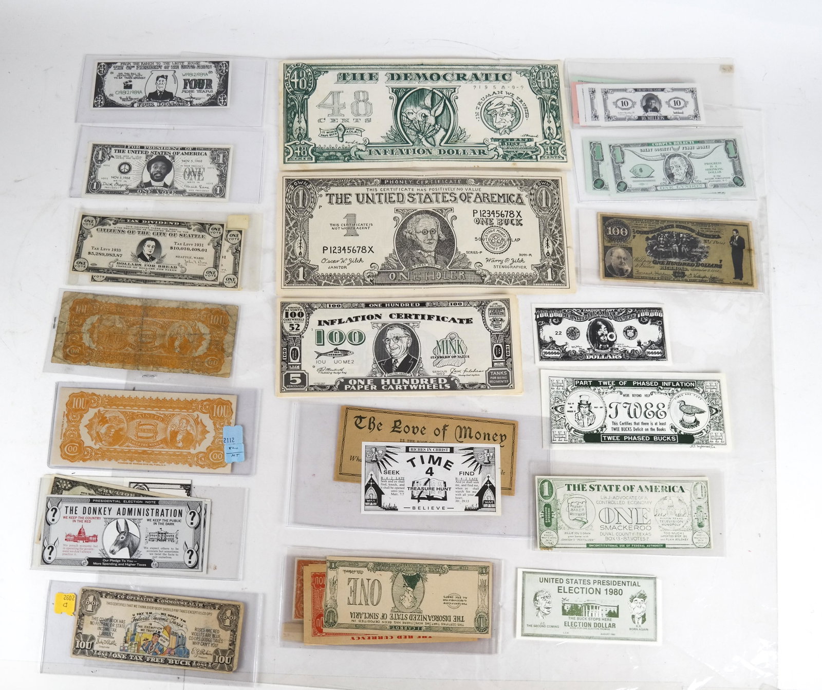 Satirical/Political Money - Discovery Lot: This large lot of satirical, political money is a treasure trove of discovery as it includes I.O.U. bills for Taft/Sherman campaign, unusual and rare Upton Sinclair money (from the "Disorganized State