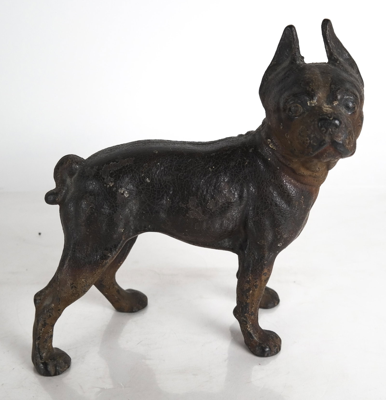 Terrier Dog Iron Doorstop: Terrier dog iron doorstop. [10 x 3 x 6 1/2 inches]. Worn.