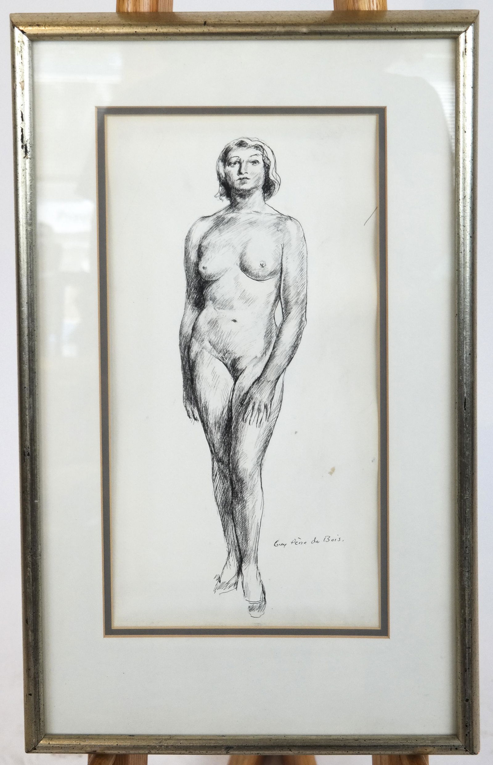 Guy PENE DU BOIS: Female Nude - Graphite on Paper: Guy Pene Du Bois (1884-1958) graphite on paper, "Standing Female Nude", signed, undated, in wood frame. [14 x 10 inches]. In good condition.