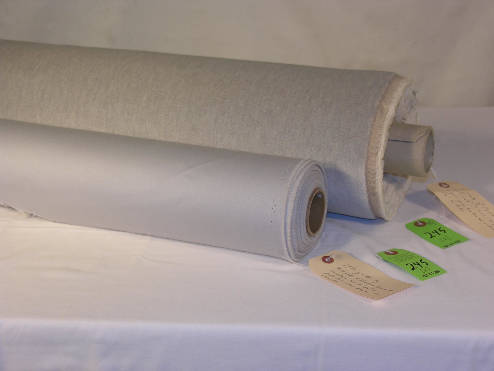 Holland & Sherry Wool Satin and Castel's Light Gre: 1) 14 1/2 yards of Holland & Sherry brushed worsted wool satin in a soft lavender blue, 55" width. All purpose residential fabric! 2) 10 yards of Castel's "Wilfred", a light grey heathered upholstery 