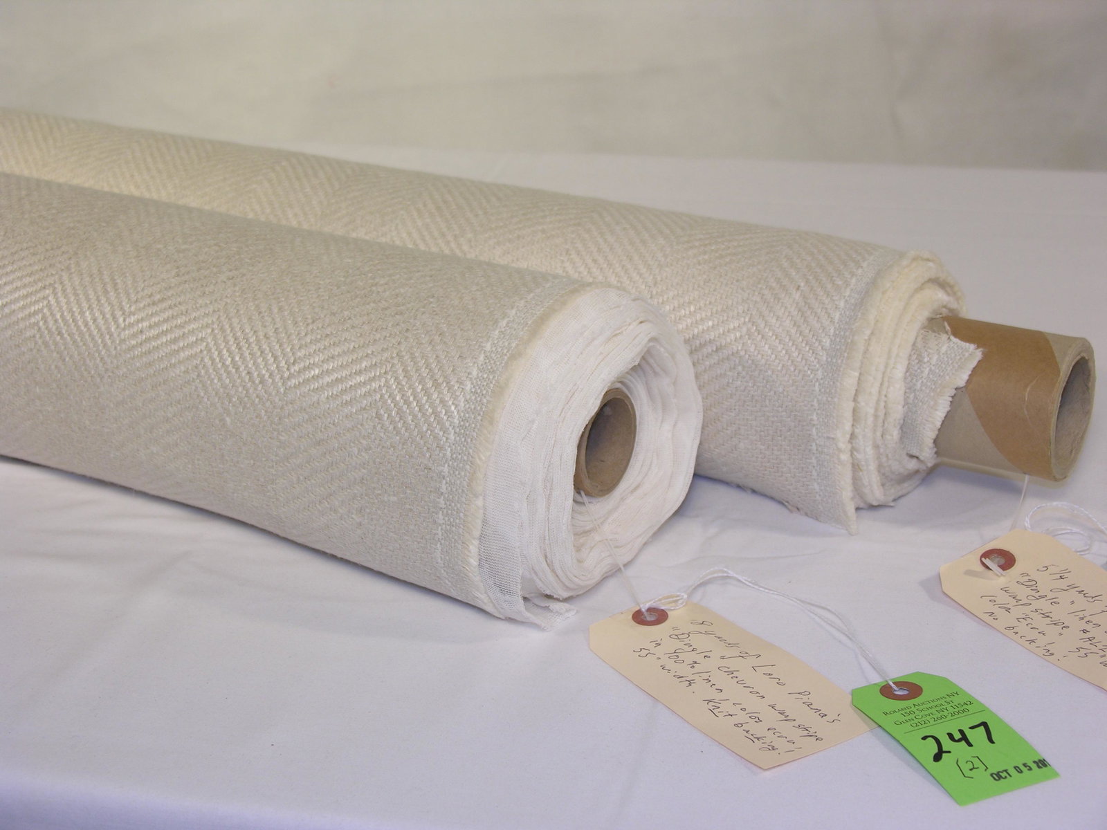 Loro Piana's Linen Chevron Stripe in Two Pieces: 13 1/4 yards of Loro Piana's 100% linen chevron warp stripe, "Dingle", #AL2009-002. tone on tone ecru. The 55" width is in two lengths; 8 yards with knit backing and 5 1/4 yards without backing. Beaut