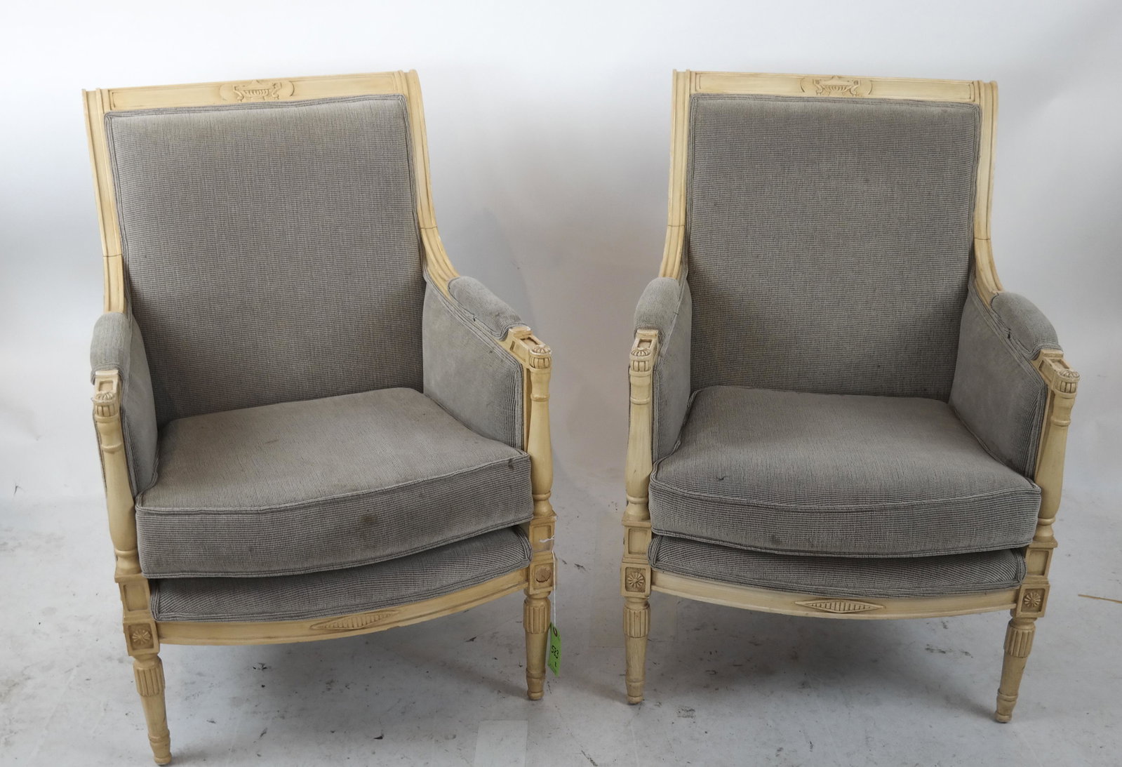 Pair Louis LXVI-Style Marquis Chairs, White Painte: Pair of Louis LXVI-style Marquis chairs with white painted frames and light green upholstery. [36 x 26 1/2 x 23 1/2 inches; 9 inches to seat]. Stains to upholstery; chips; wear; one rosette missing fr