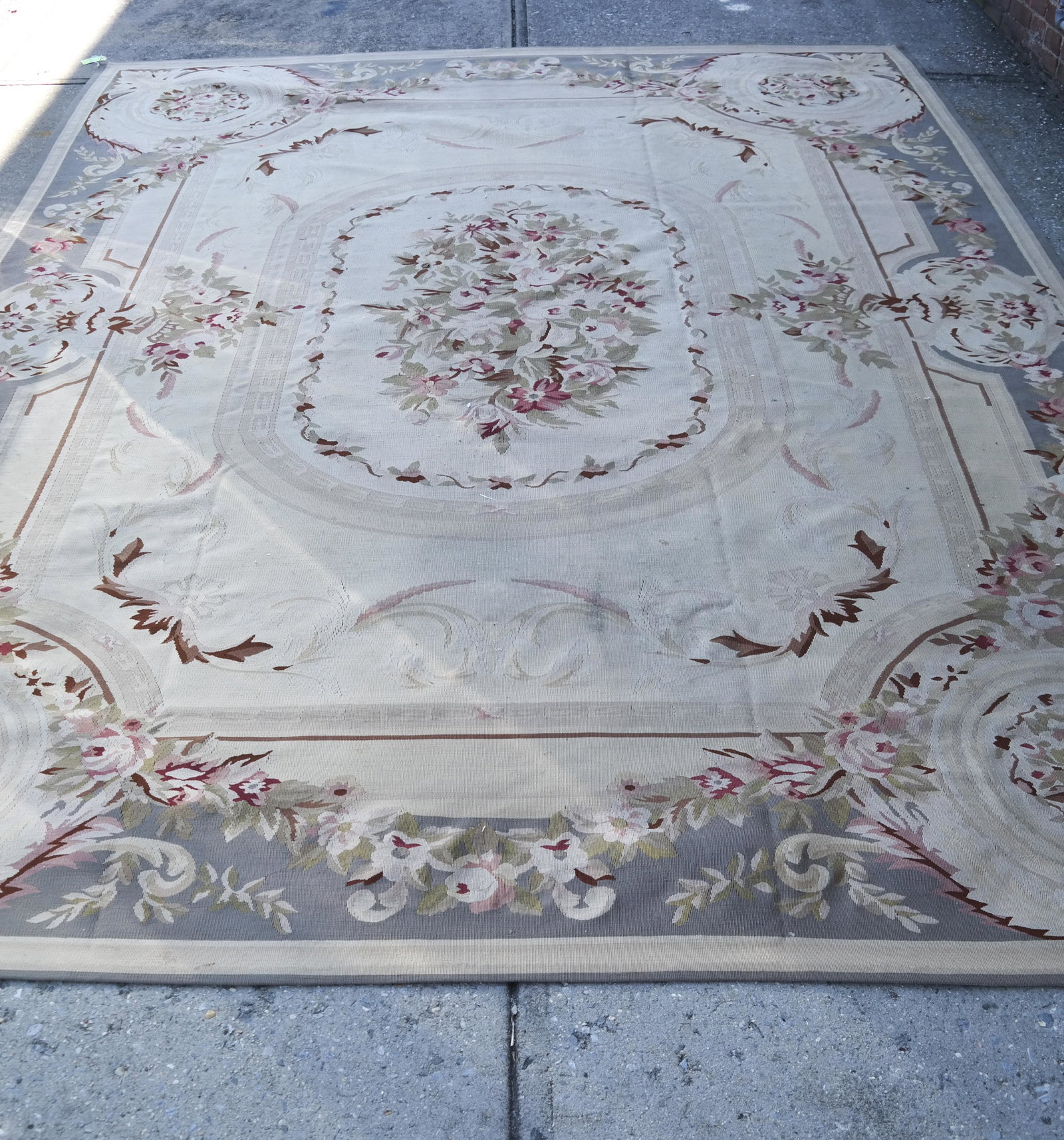 Aubusson Rug: Aubusson rug. [11'6" x 8'6"]. Light staining; light wear.
