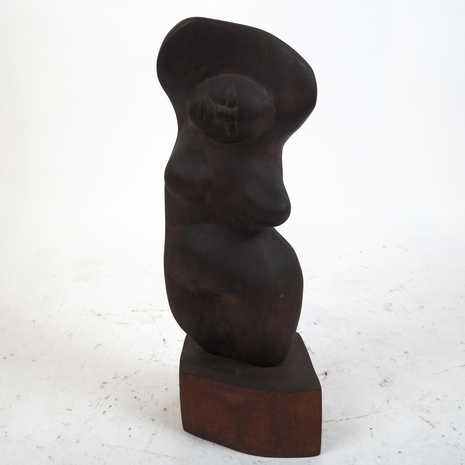 Miriam NAAMAN: "Woman Undressing" - Sculpture: "Woman Undressing" mahogany sculpture by Miriam Naaman (Polish). [Sculpture: 19 x 9 x 5 inches; Base: 5 x 10 1/2 x 8 1/2 inches].