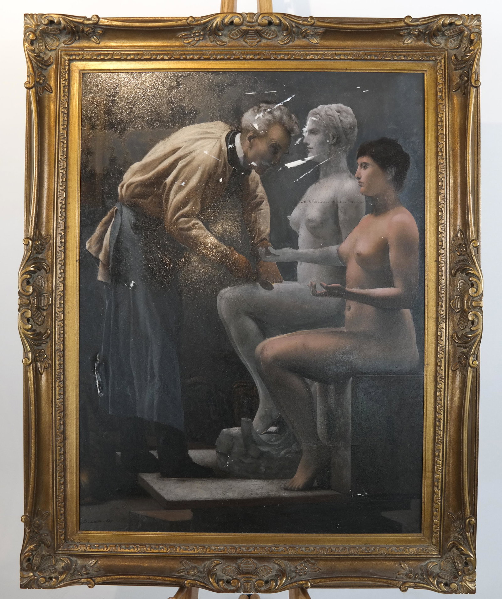 B. LEON: Artist and Nude Model - Oil on Canvas: A framed painting of an artist with a female, nude model. Paper stock to canvas, can be removed. Dated 1869, signed lower left. [Art: 40 x 30 inches; Frame: 49 x 39 1/2 inches]. Tear lower left.