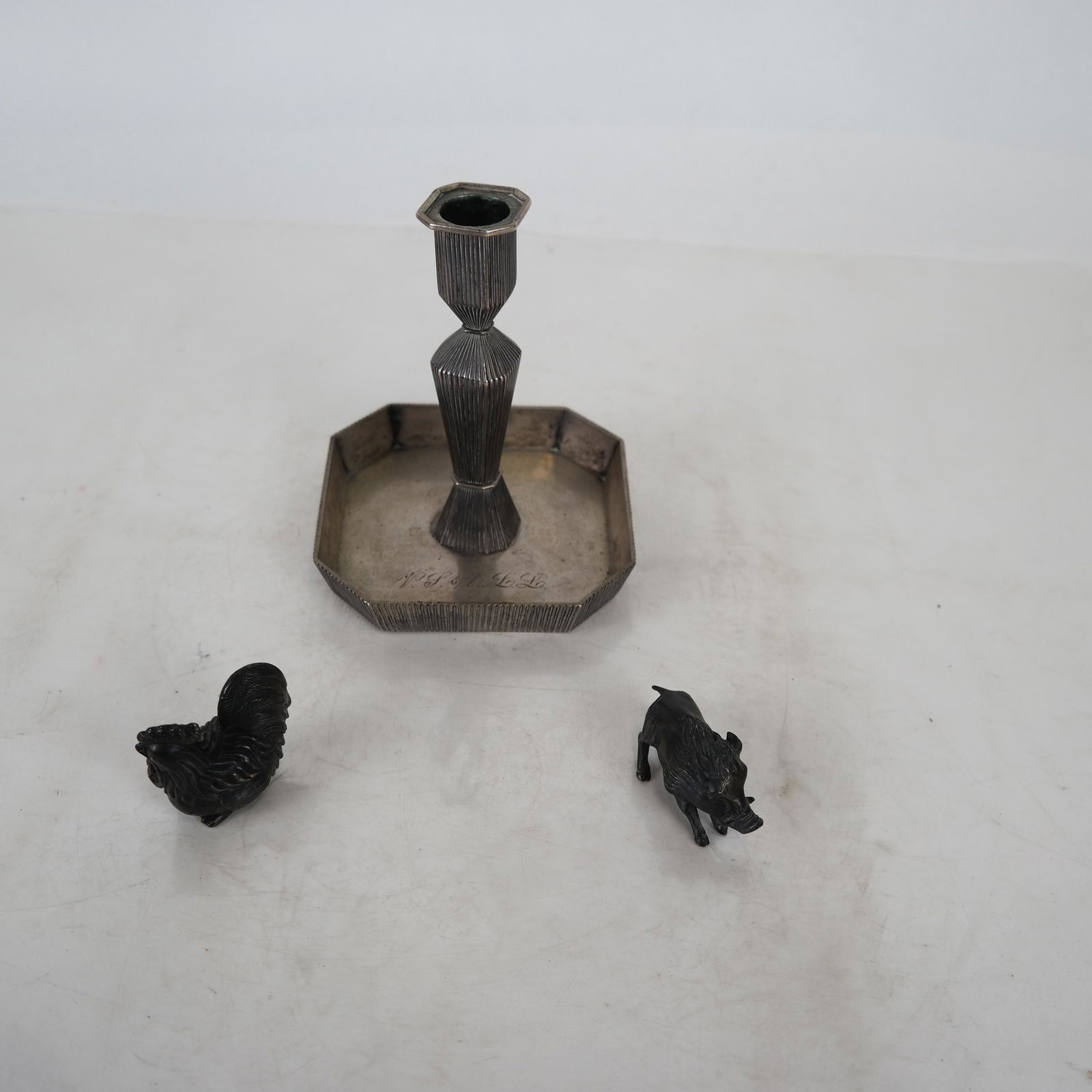 A Silver Plate Candlestick, & Two Bronze Figurines (1 of 6)