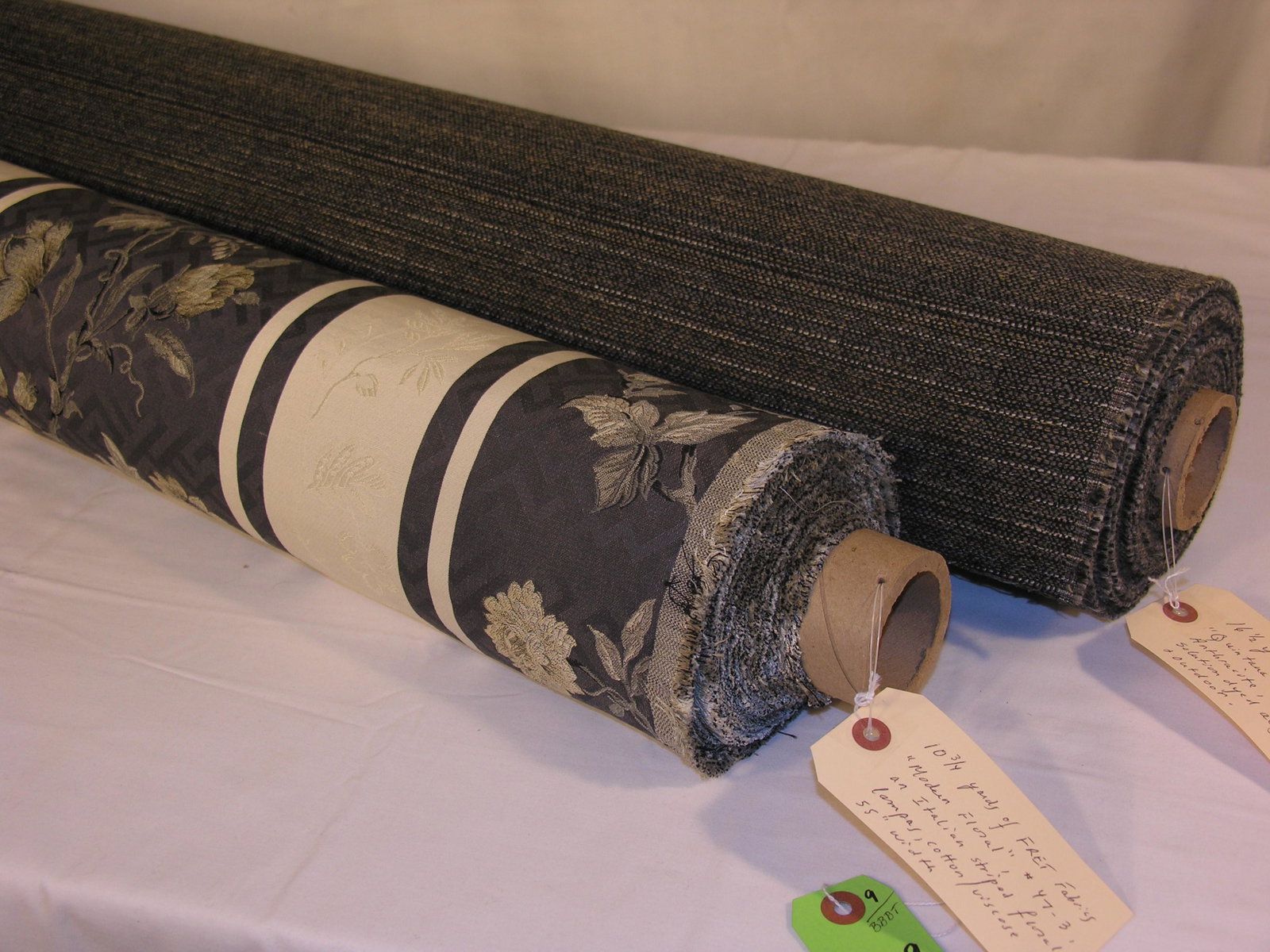 Two Bolts of FRET's Designer Fabrics: 1) 10 3/4 yards of FRET's "Modern Floral" cotton/viscose Italian Lampas in a classic striped floral design, #47-3. The multi-colored on cinder and ivory is 55 inches wide with a 27 1/2 inch vertical b