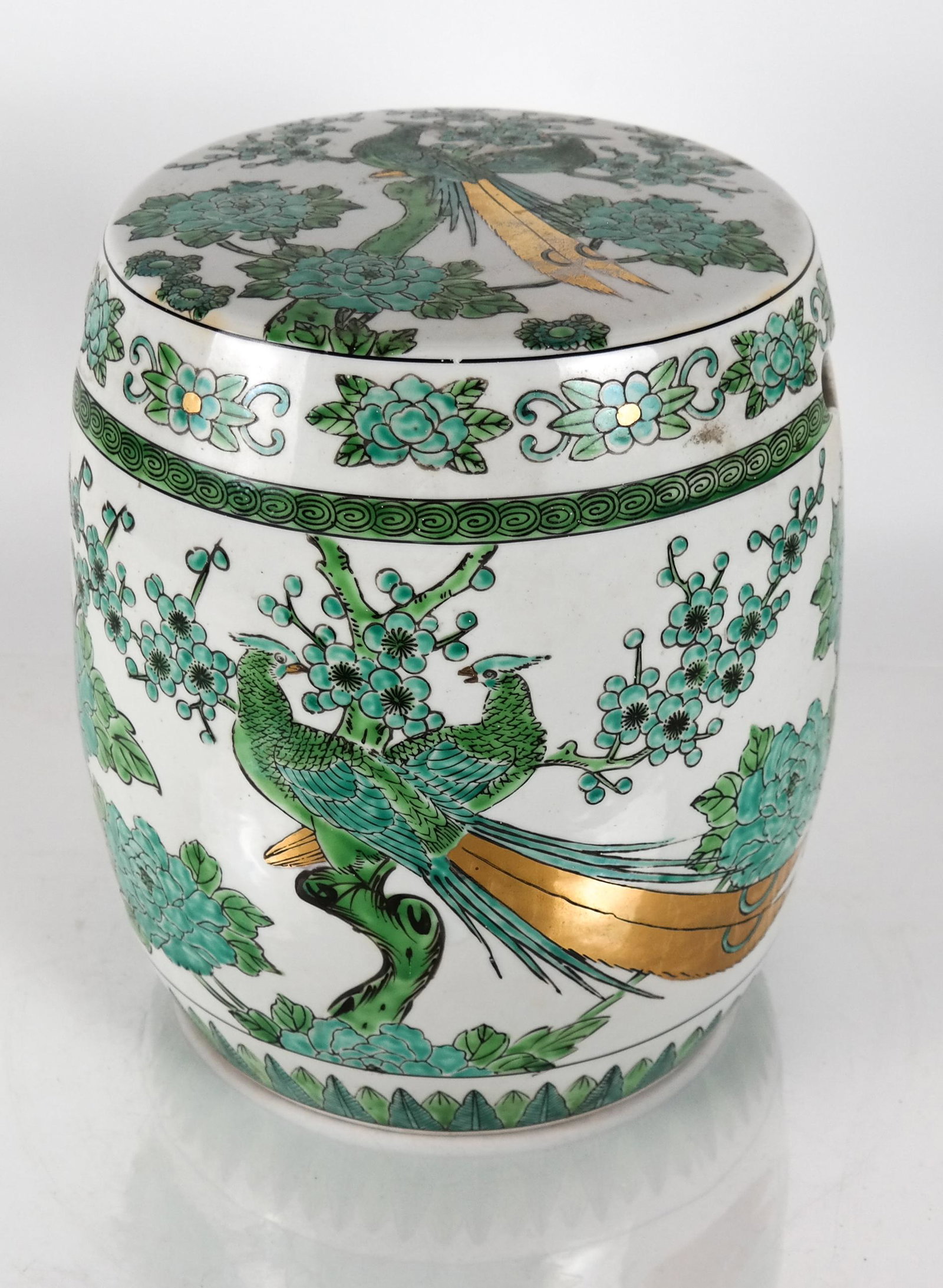 Chinese Porcelain Garden Seat: Antique Chinese decorated garden seat. [12 3/4 x 9 1/2 (dia) (top) inches]. In overall good condition.
