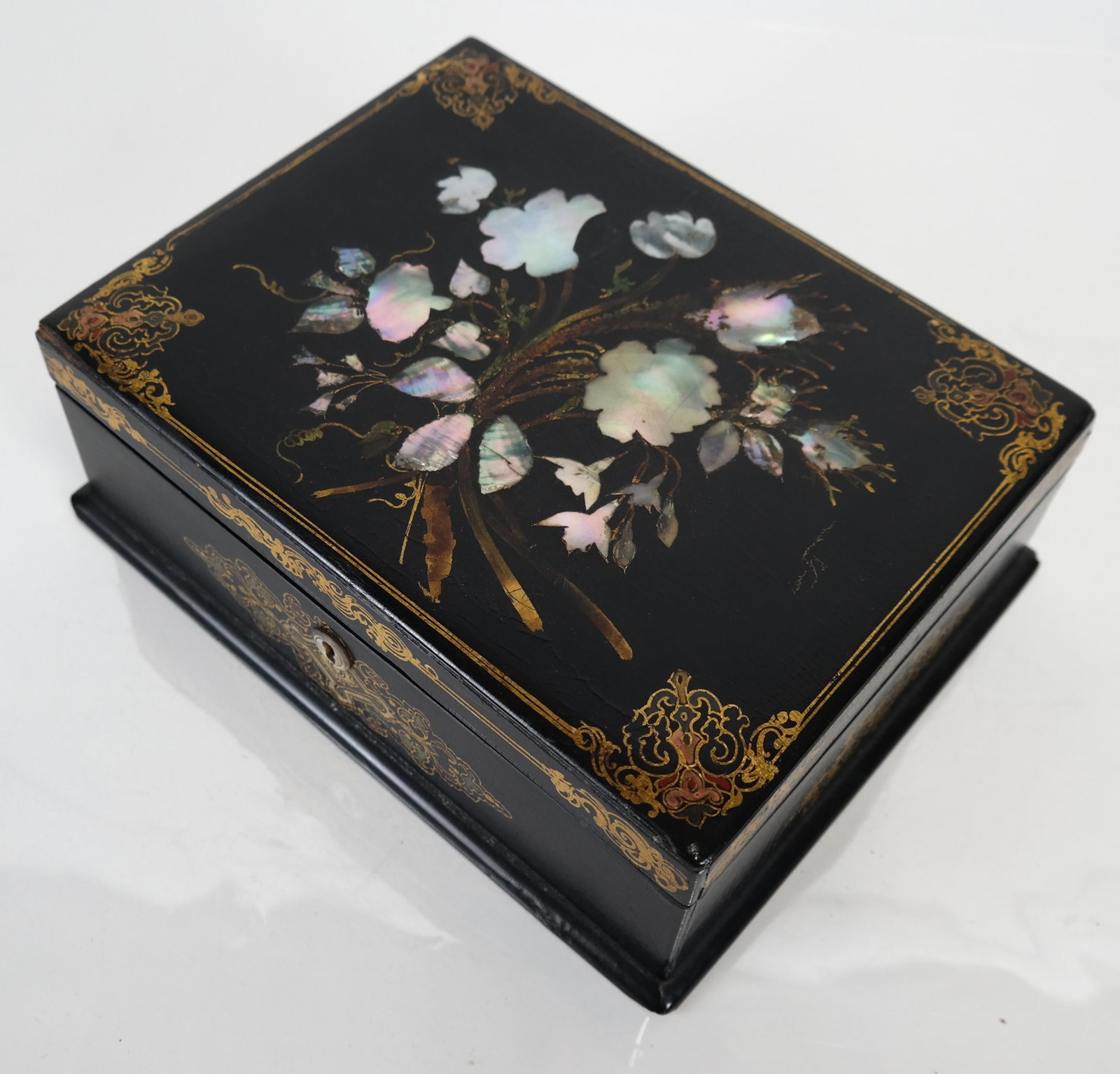 Victorian Mother of Pearl & Lacquer Box: Victorian mother of pearl and lacquer box, mirrored felt interior. [3 1/2 x 10 x 8 inches]. In "as-is" condition.