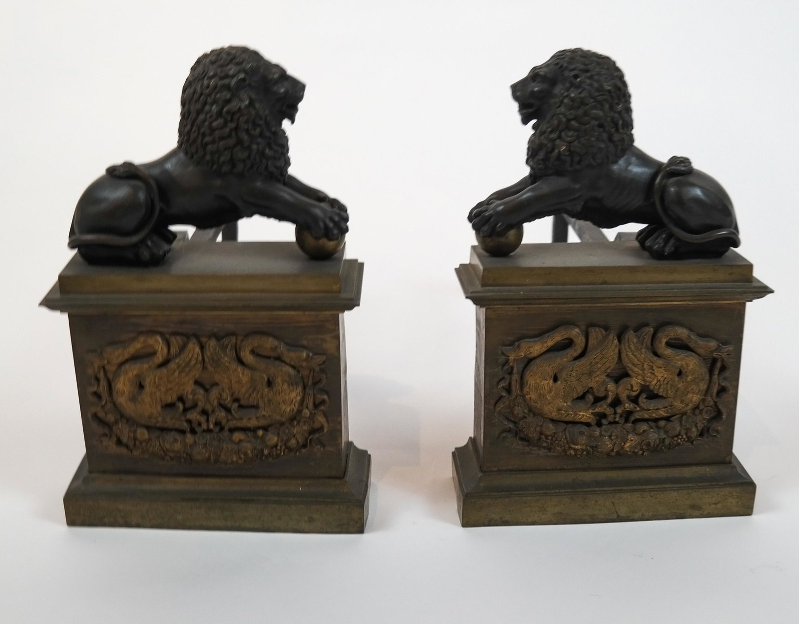 Pair of Lion-Form Andirons & Dore ( Gilt ) Fender: Pair of lion-form andirons, and gilt (dore ) fender [Each: 13 1/2 x 8 1/2 x 17 1/4 inches]. In good condition.