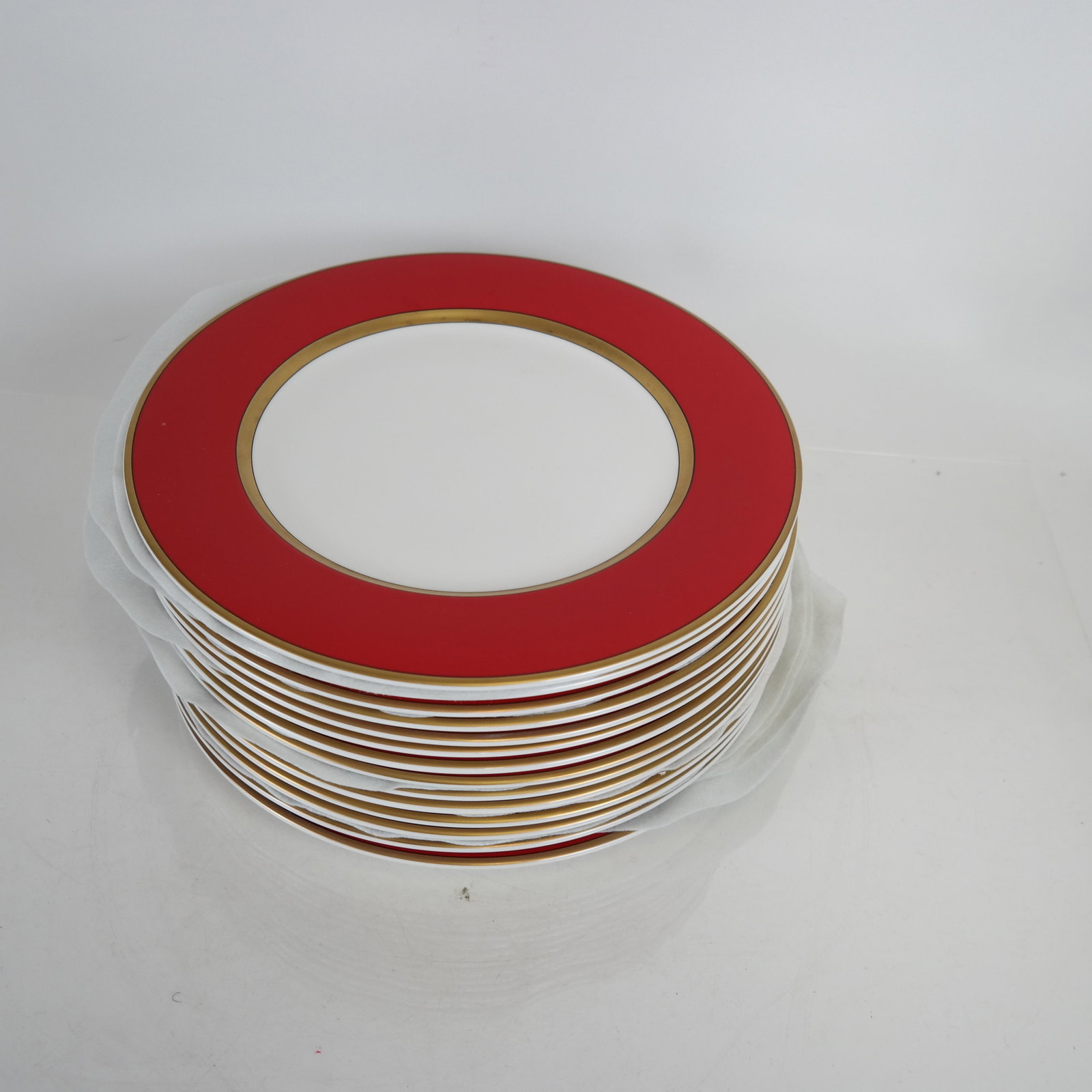 Fitz & Floyd "Holiday Pine" - 15 Plates: 15 white with red border dinner plates. [12 (dia) inches].