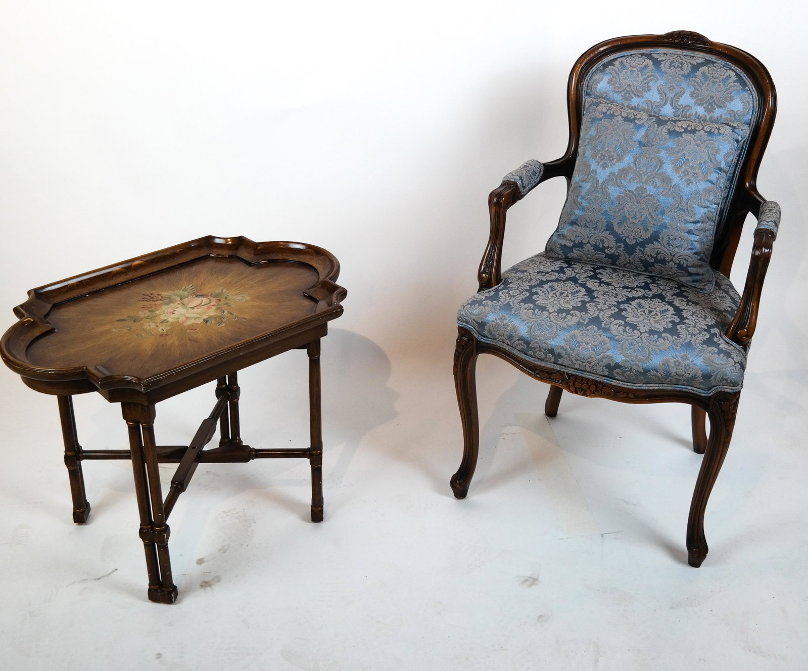 Arm Chair & Tray-Top Table: A removable tray-top table [21 x 28 x 18 inches] together with a walnut arm chair upholstered in blue fabric [38 x 22 x 18 inches; 18 inches to seat].