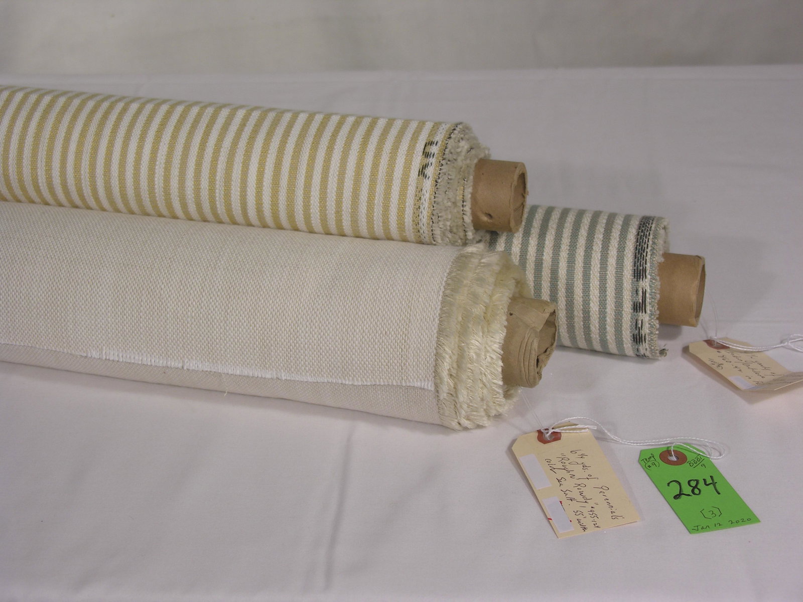 Three Companion Perennial Designer Fabrics: 1) 6 1/4 yards of Perennial's "Rough N Rowdy" solid plain in color "Sea Salt", #955-124. The off-white luxury fabric, 55 inch width, is stain, fade and mildew resistant, great for indoors or out! 2) 4