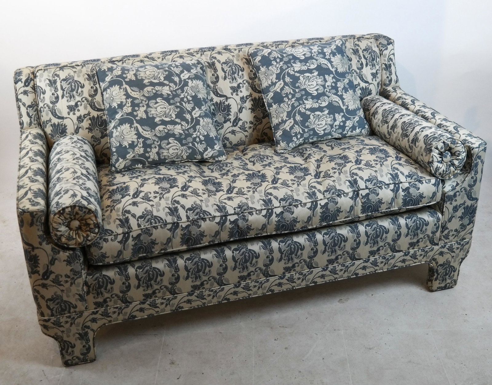 James Mont Manner Settee: James Mont manner settee, with down and feather filled cushions, from an important Park Avenue, NYC collection. [30 x 60 x 33 inches; 18 inches to seat]. In good condition.