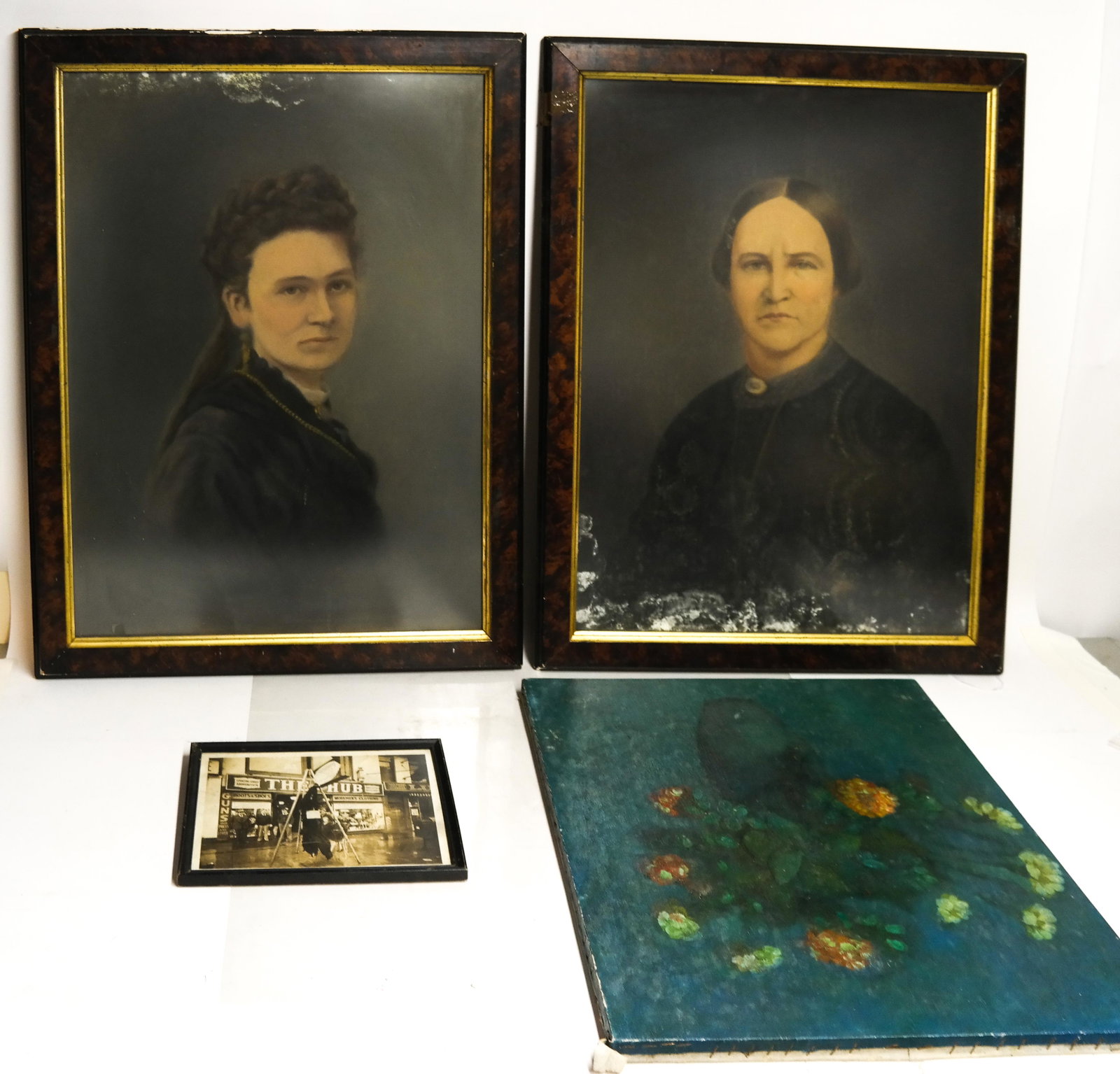 Four Art Works, Incl. Wm. LYBERIS: Pair of portraits of women [Frames: 30 x 23 inches], William Lyberis "Still Life", unframed [23 x 19 inches] and an antique photograph of a gun shop [8 x 10 inches].