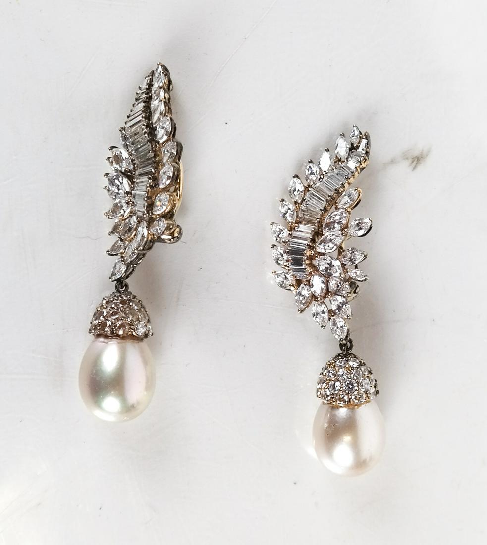 .800 Silver Clip Earrings: .800 silver, zirconia and faux pearl clip earrings.