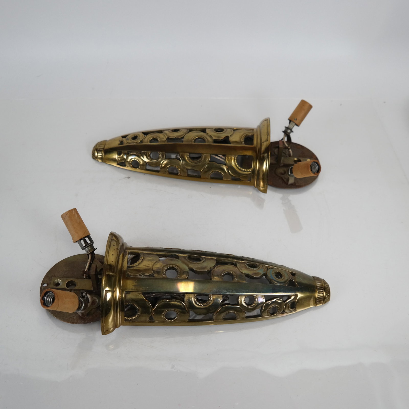 Pair Deco Sconces, Alabaster Shades: Pair of gilt bronze sconces each with repaired/as-is alabaster shades. [Sconces only: 15 x 5 inches; Shades only: 8 x 15 inches]. Repairs.