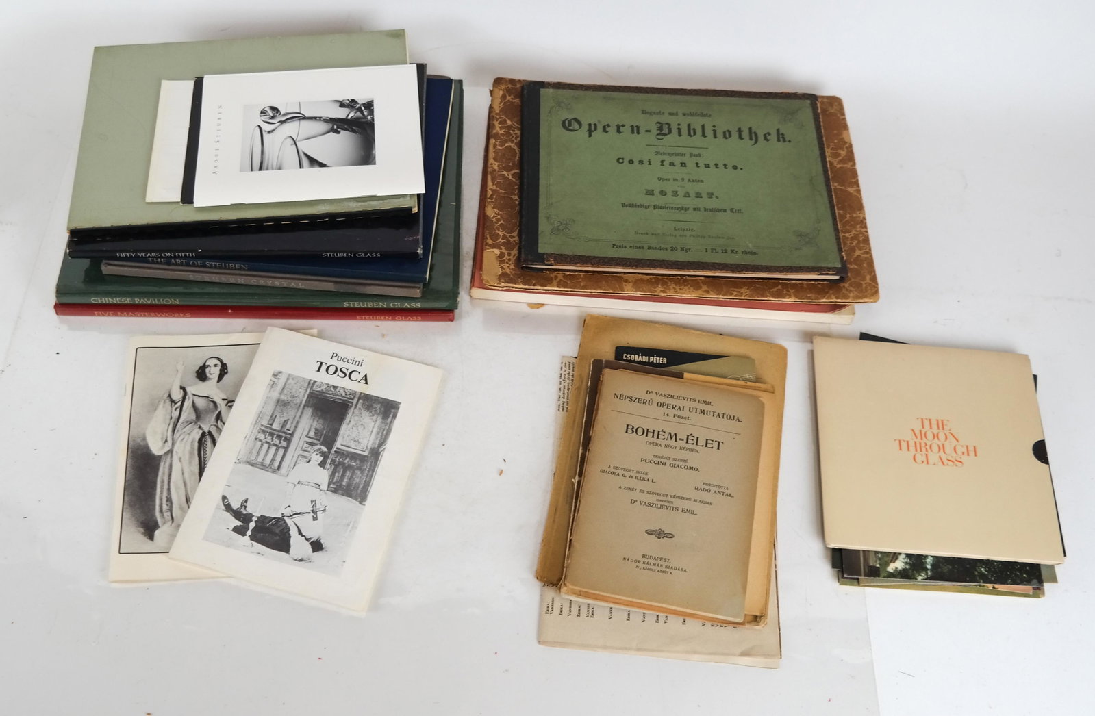 Pamphlets & Books on Opera & Steuben Glass: Vintage lot of books and pamphlets on opera and music, including Bach and Mozart sheet music books, together with 8 pamphlets and books on Steuben glass.