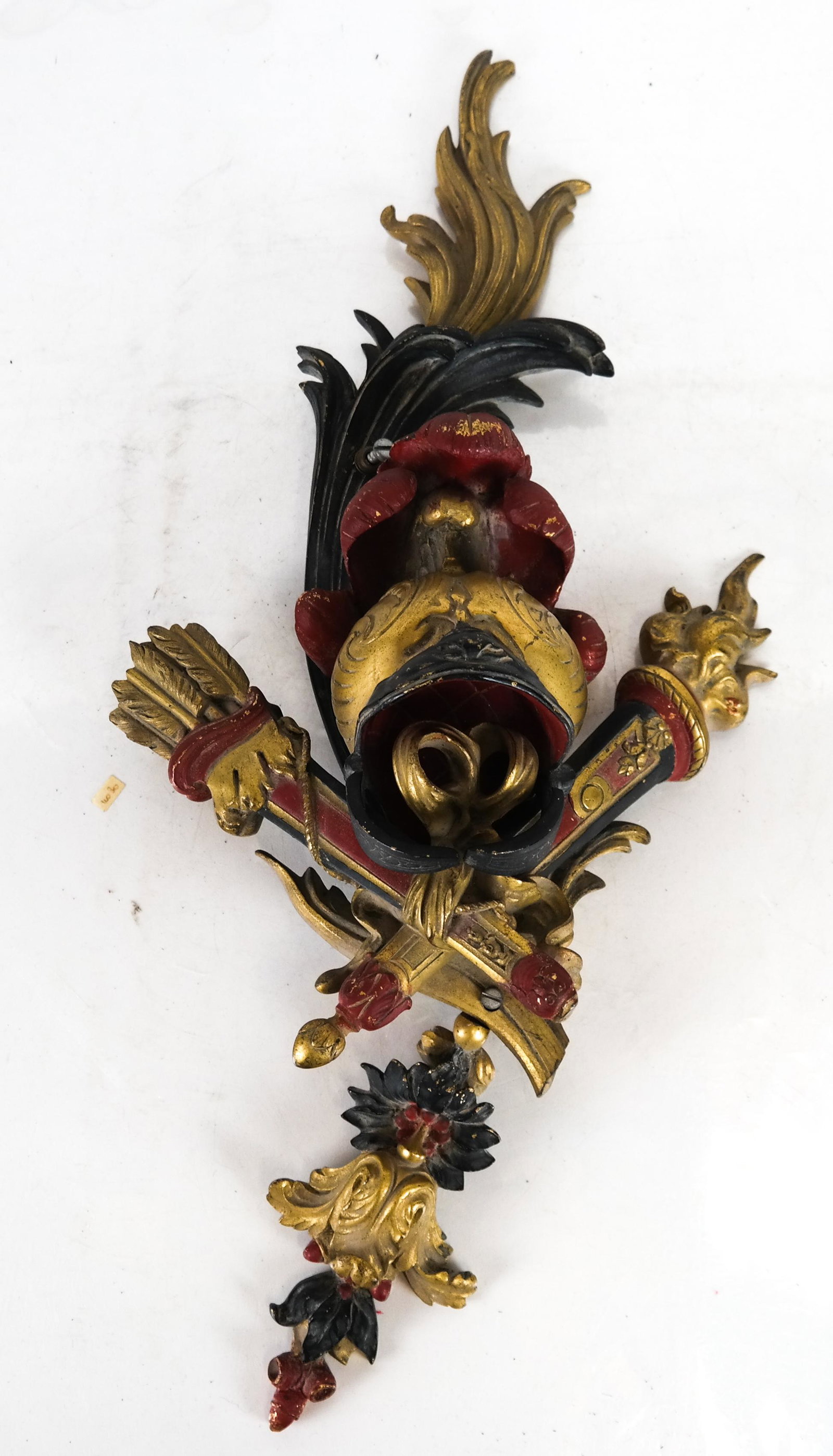 Cold Painted Bronze Applique: A bronze coat of arms-style wall applique. [24 x 9 1/2 inches].