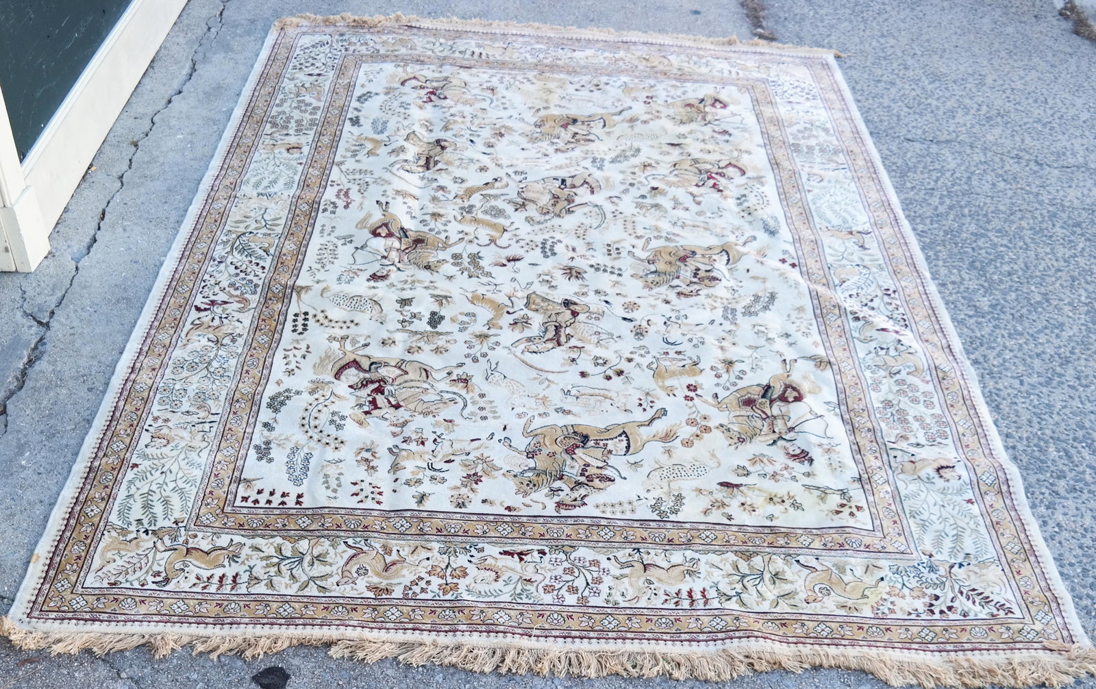 Silk Rug with Horse, Warriors: Contemporary silk rug, Mongolian battle scene. [116 x 76 inches]. In overall good condition; minor mend.