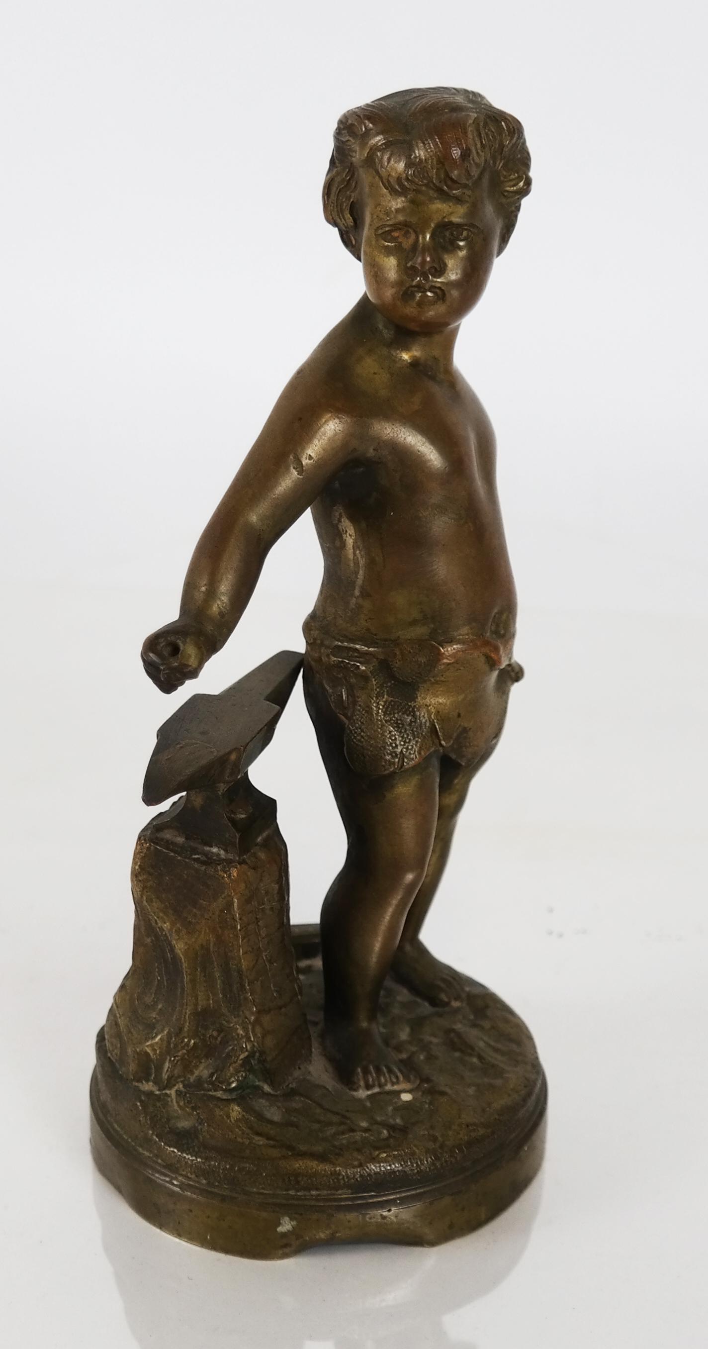 Adolphe Jean LAVERGNE - Tiffany & Co. Bronze Boy: Adolphe Jean Laverne sculpture, marked Tiffany & Co., bronze boy beside an anvil. [7 3/4 inches high; Base: 3 3/8 (dia) inches]. Dent at bottom of base; hands have holes for missing elements.