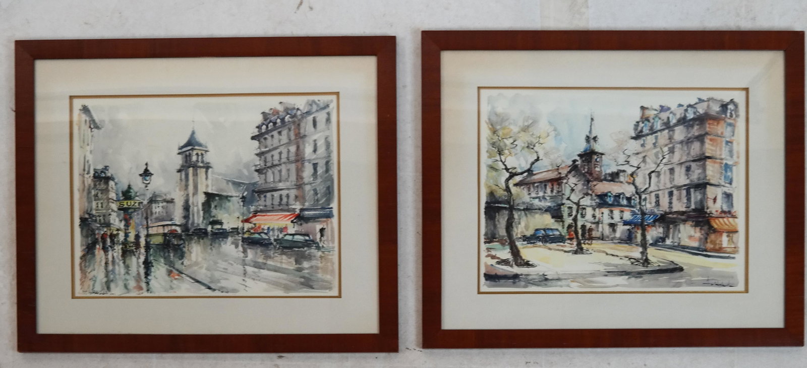Pair of Paris Street Scenes - W/C: Pair of Paris street scenes, watercolors, signed illegibly. [Art: 12 x 15 inches; Frame: 20 x 24 inches]. Both in good condition.