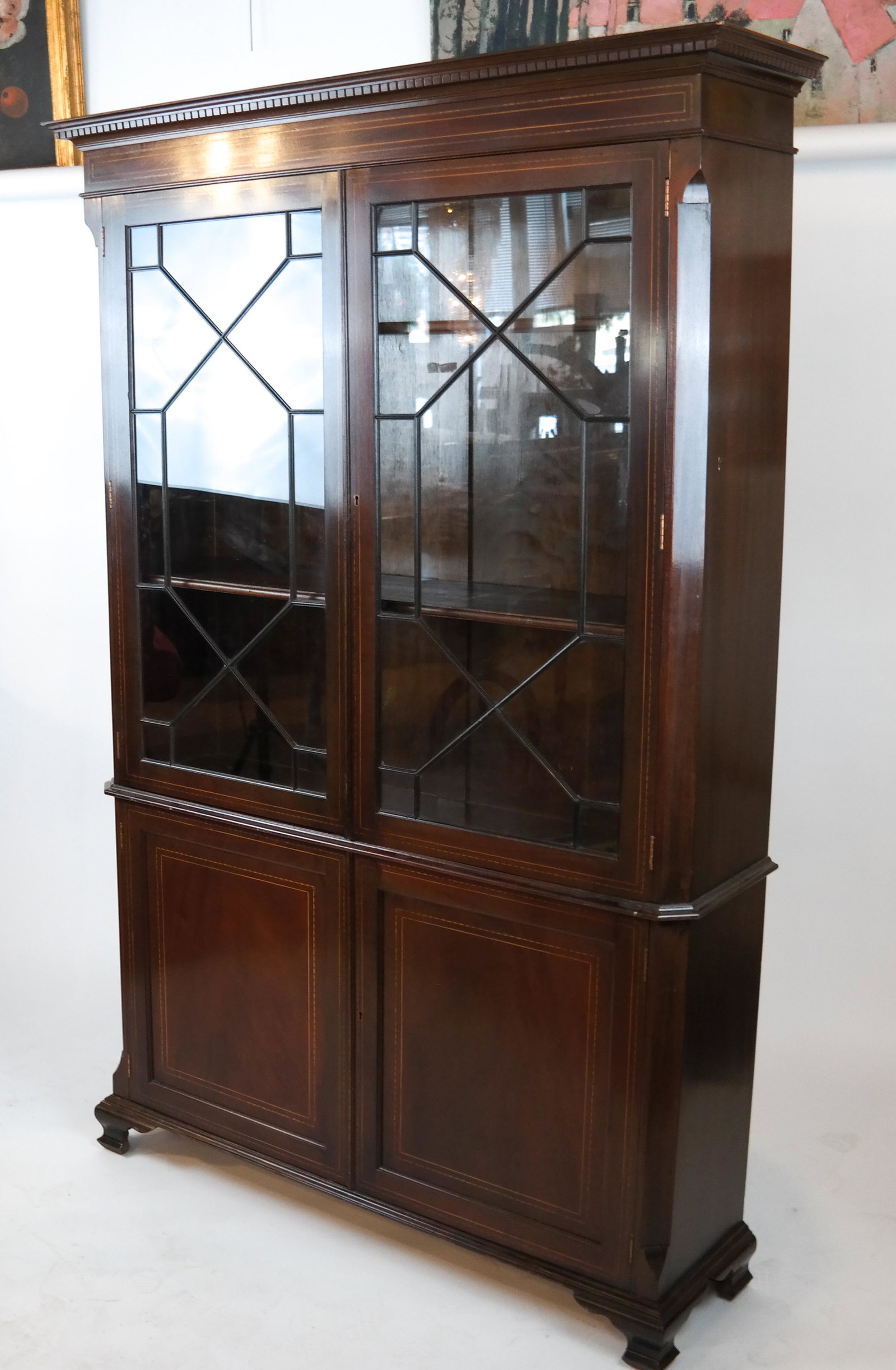 George III-Style Inlaid Mahogany Bookcase/Cabinet: George III-style inlaid mahogany bookcase/cabinet. [80 x 52 x 15 inches].