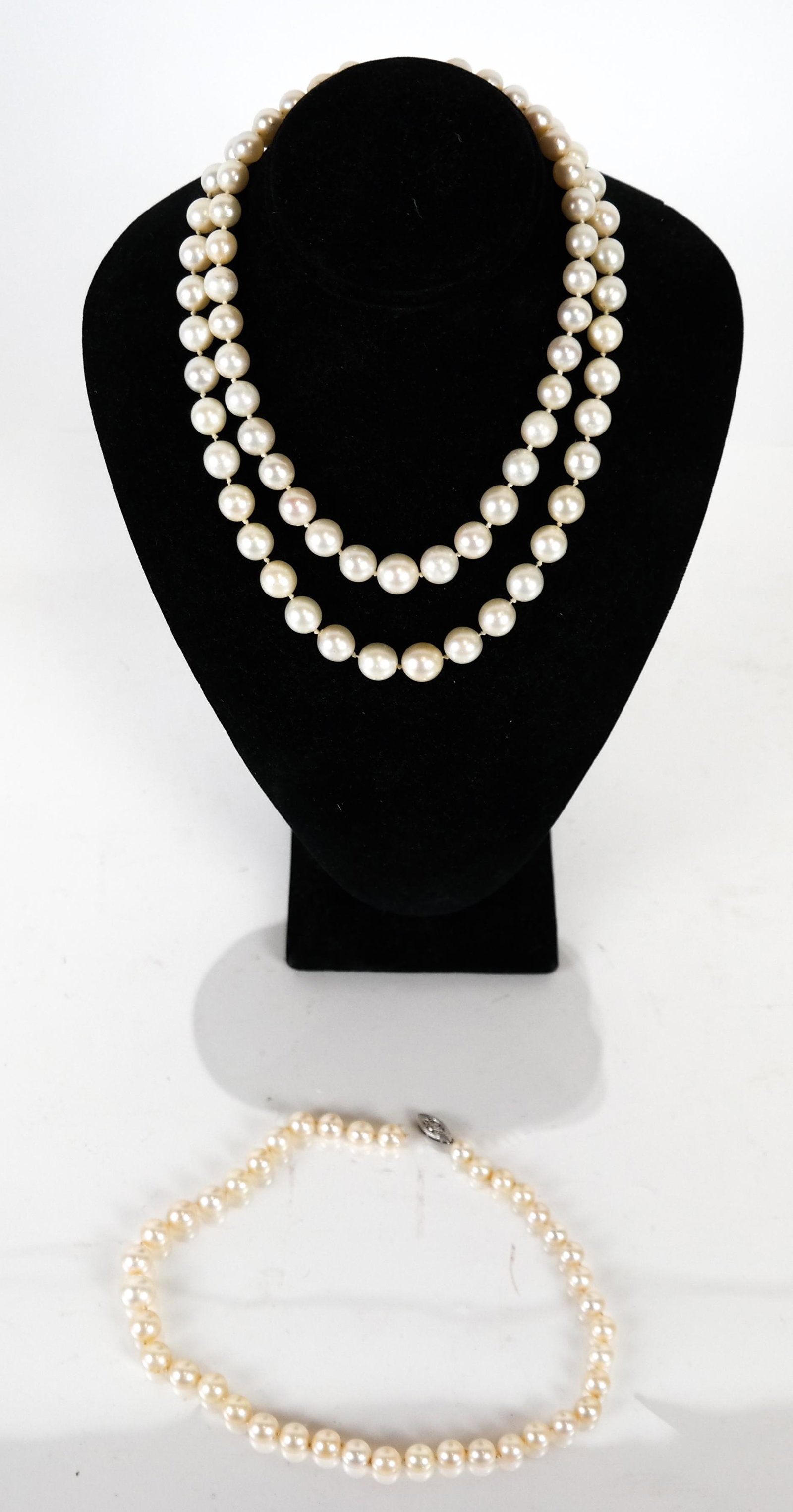 Three Cultured Pearl Necklaces/Chokers: Three cultured pearl necklaces/chokers, all with 14K white gold clasps. One clasp broken.