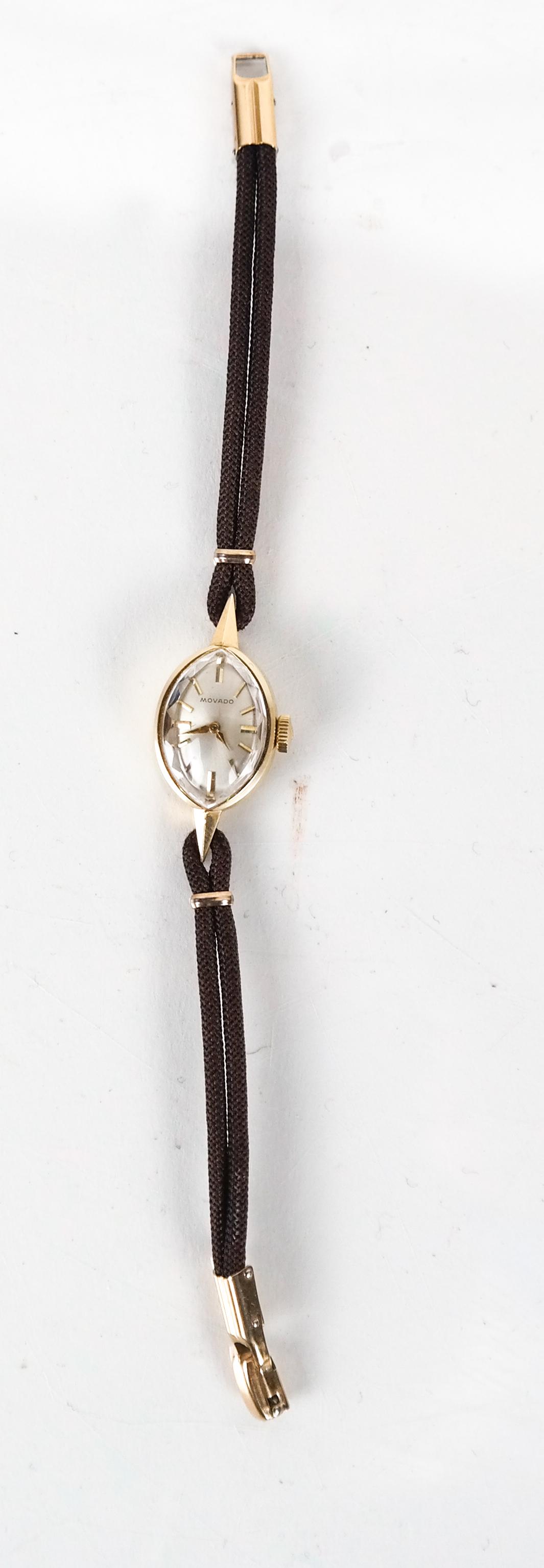 14K Gold Movado Ladies Watch: Vintage ladies wrist watch with original band.