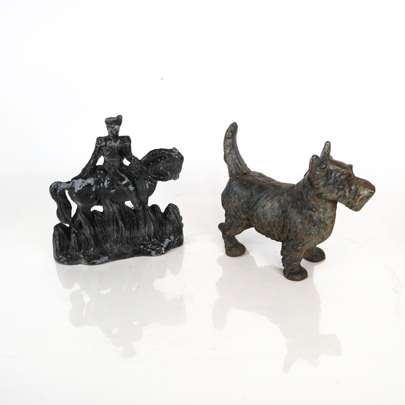 Two Iron Door Stops: Man, Dog (1 of 5)
