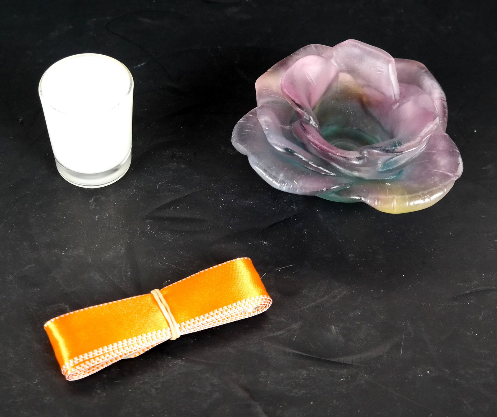 Daum Flower Votive Holder: Daum flower votive holder in original box, with votive. In "like new" condition.