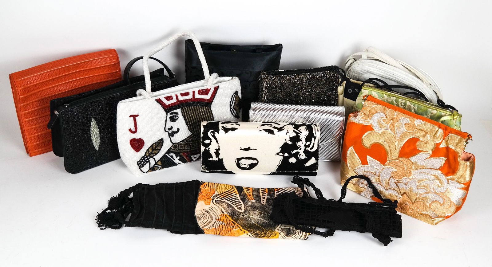 Lot of 14 Quality Bags and Clutches: Lot of 14 ladies' pochettes, clutches and cosmetic bags. In gently used and mint condition.