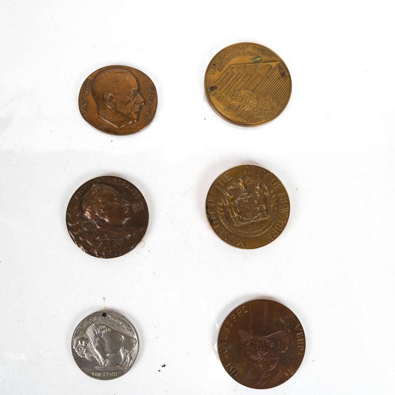 Six Large Medallions, Bronze, Other: Group of bronze medallions, including Metropolitan Opera, Thomas Mann, Richard Strauss, Museum of City of New York, Giuseppe Verdi, and a large silver metal replica of the Buffalo Nickel. [Largest: 3