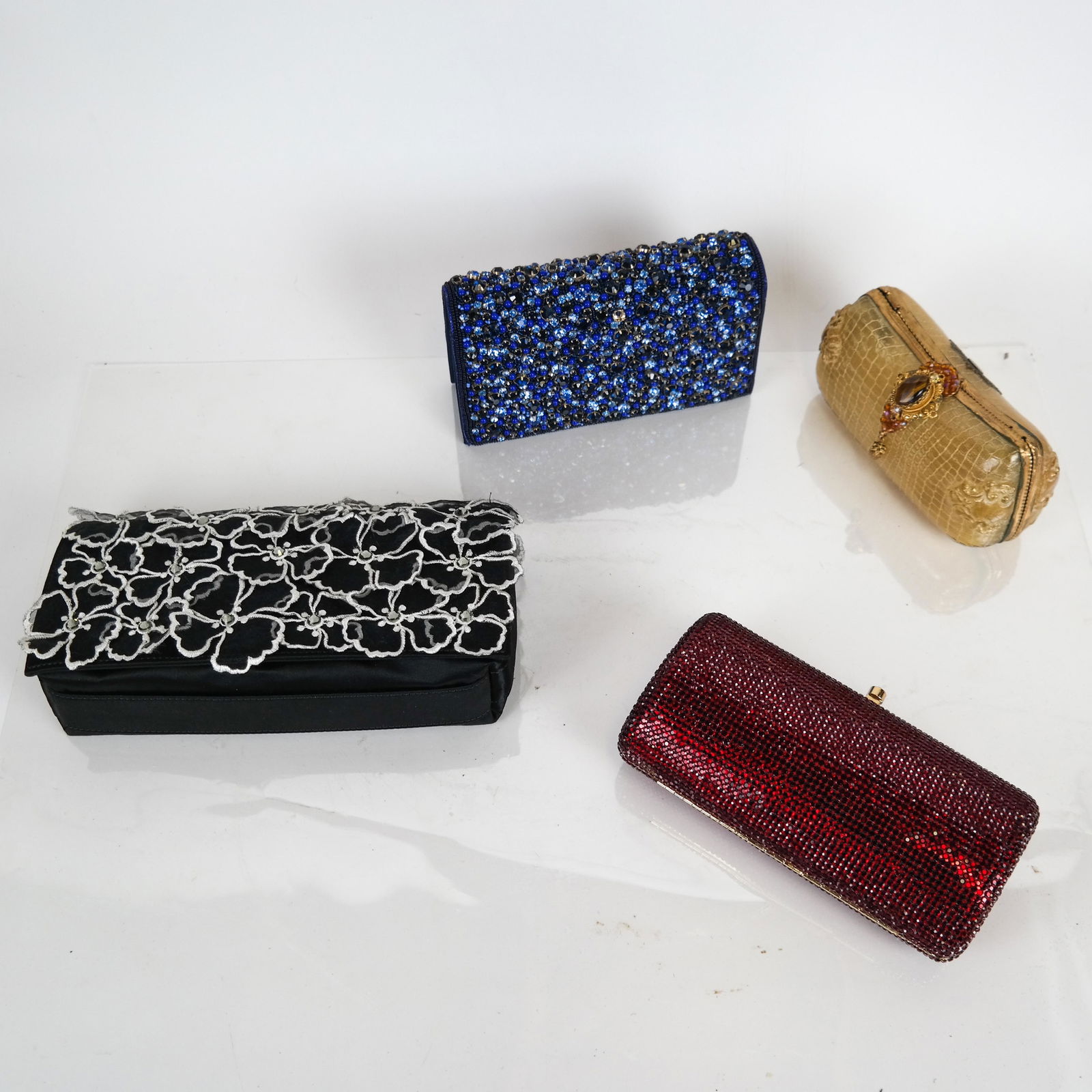 4 Beaded & Crystal Evening Clutches: Lot includes evening bags by Stuart Weitzman, Blumarine, Maya and one unmarked. [Largest: 5 1/4 x 9 3/4 x 2 inches]. All in good condition.