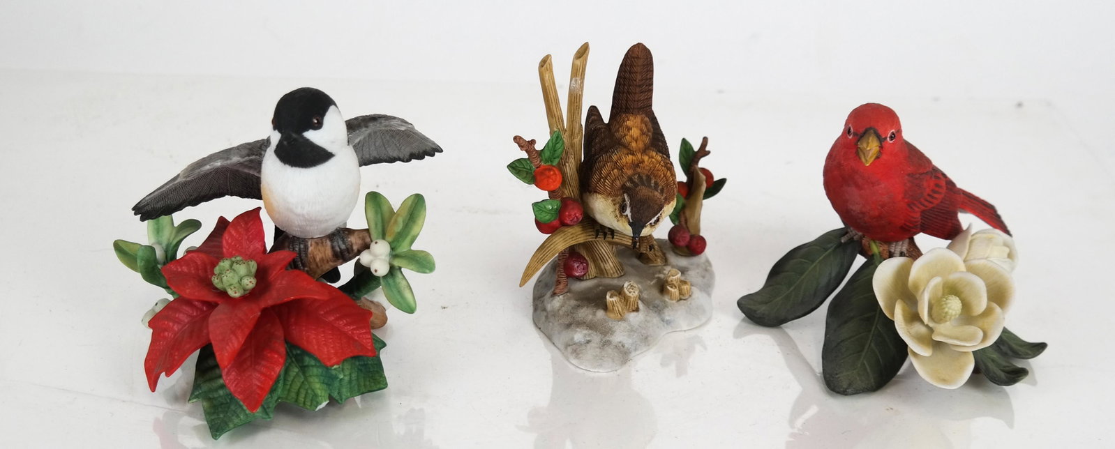 Three Lenox Porcelain Birds: Three Lenox porcelain birds. [Largest: 4 1/2 x 4 1/2 (dia) inches]. In overall good condition.