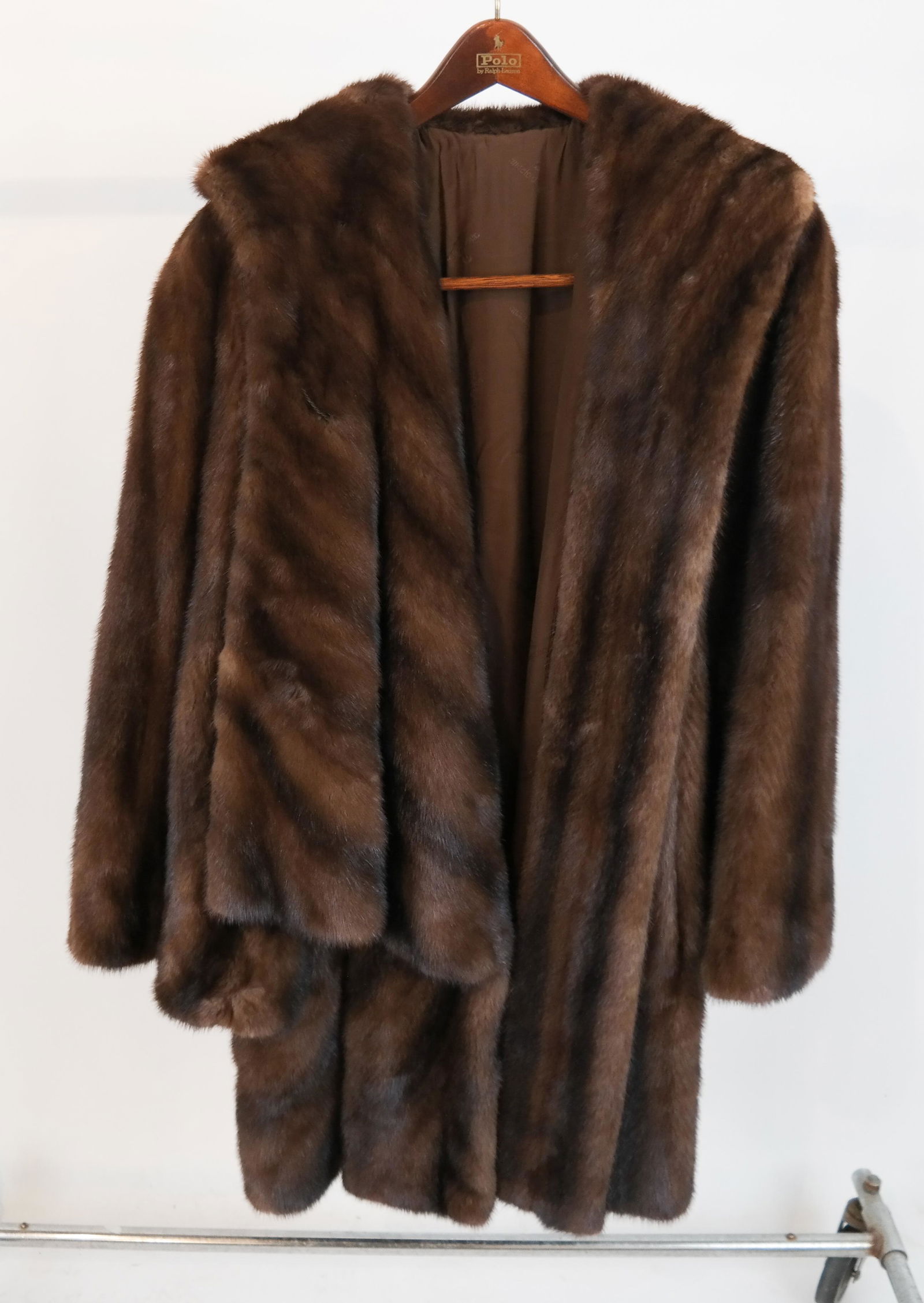 Demi Buff Directional Mink Coat with Hood: Ladies demi buff 7/8 length directional mink coat, with hood, custom cleaned and glazed in July 2019. Size M. In good condition.