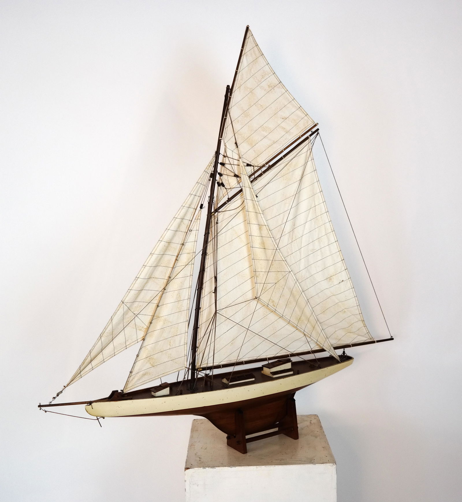 Model Sailing Vessel: Model sailing vessel. [Boat only: 48 x 47 inches]. Sails soiled; not complete.