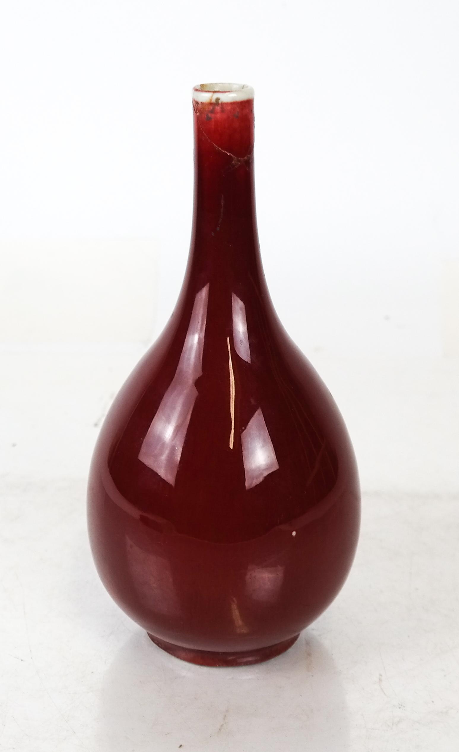 Asian Sang de Boeuf Vase: Antique Asian bulbous-form oxblood vase. [8 inches].