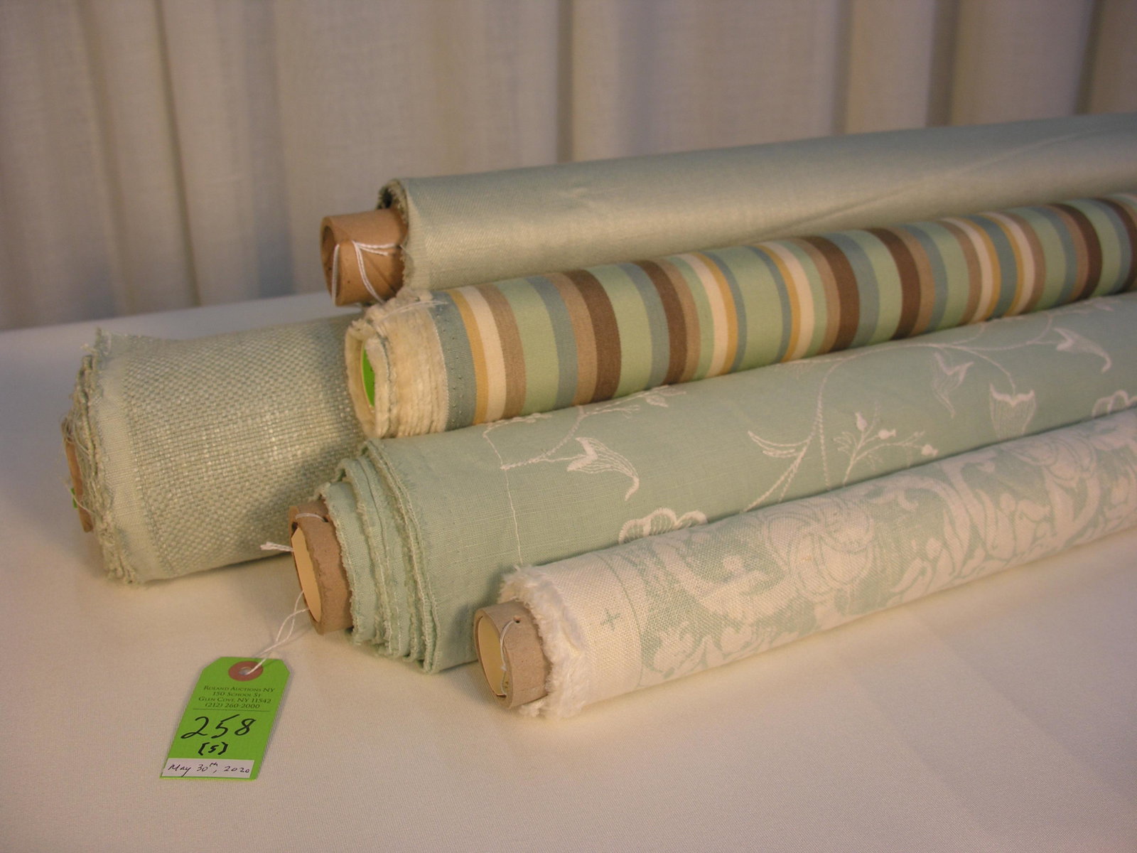 Group of Seafoam Home Fabrics: 1) 6 1/4 yards of an embroidered white viscose on a seafoam green cotton, 57 inches wide. Design repeats of 12 1/2 x 12 1/2 inches, with a panel to panel match up of 50 inches. 2) 6 1/2 yards of a sea
