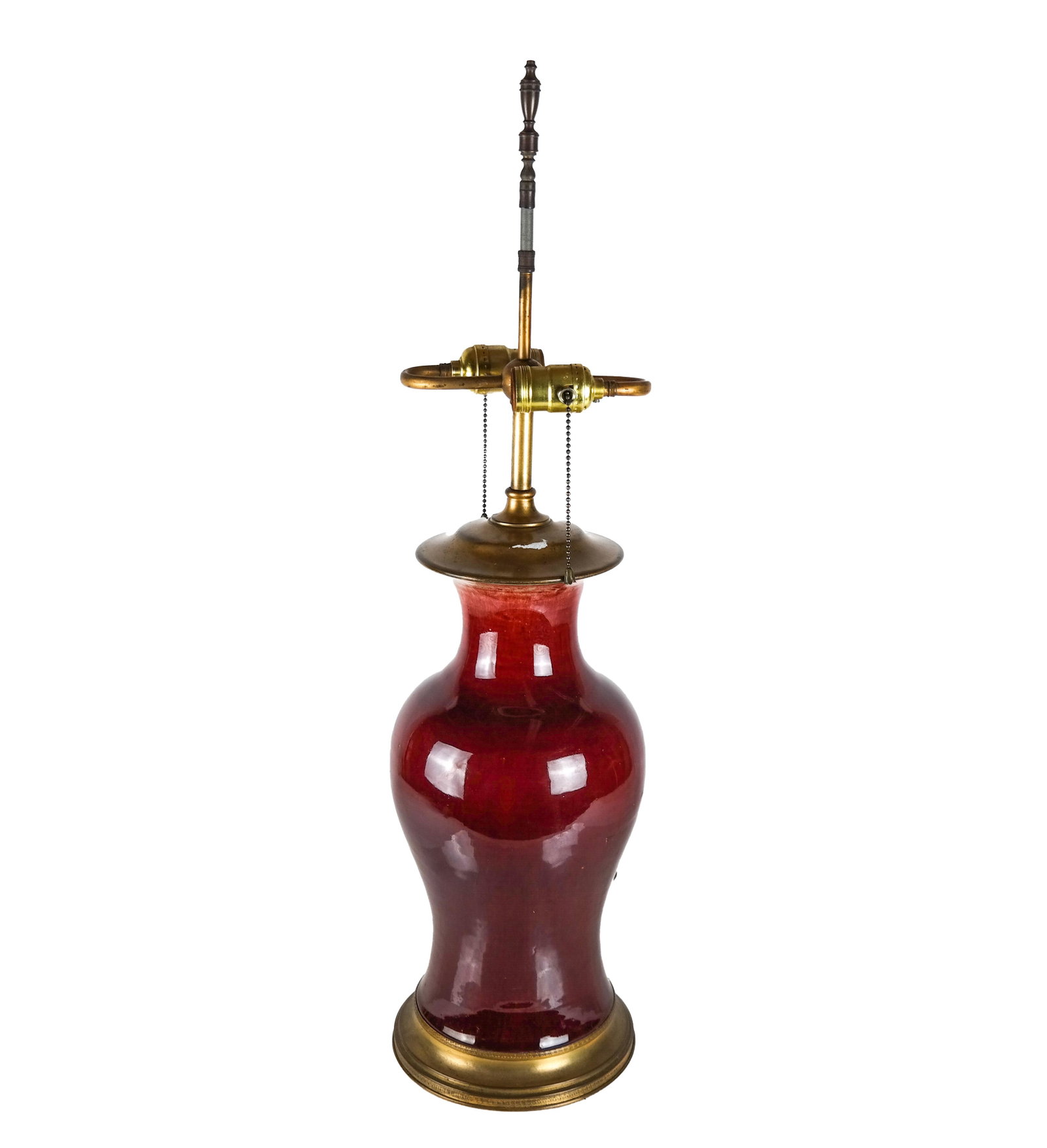 Chinese Sang de Boeuf Glazed Lamp: Chinese sang de boeuf glazed vase, made into a lamp, with bronze mounts. [Overall height: 31 inches; Base: 7 1/2 (dia) inches]. In good condition; not tested.