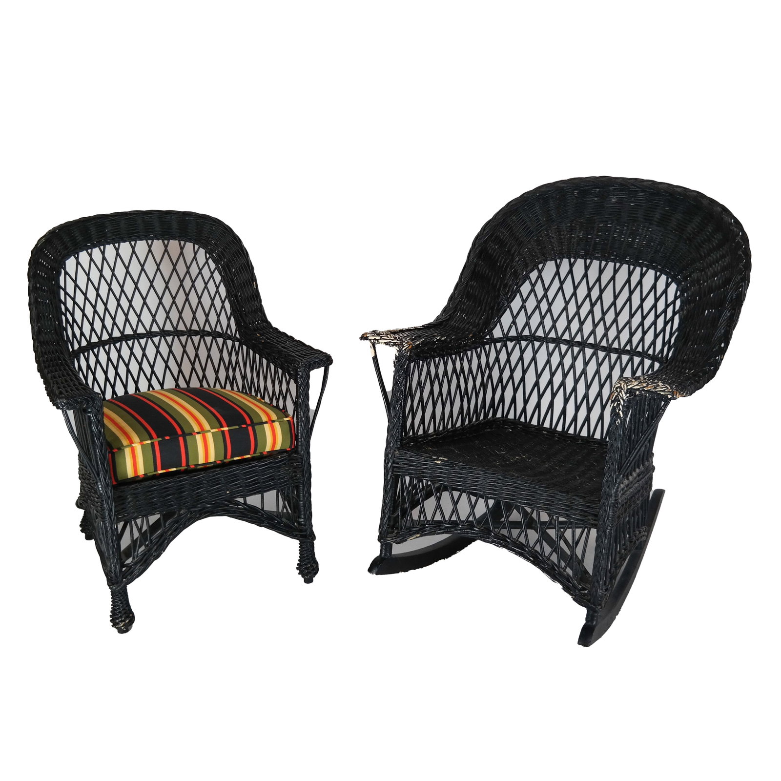 Two Antique Wicker Chairs: Two antique wicker chairs. One is a rocker. [40 x 30 x 30 inches; 17 1/2 inches to seat].