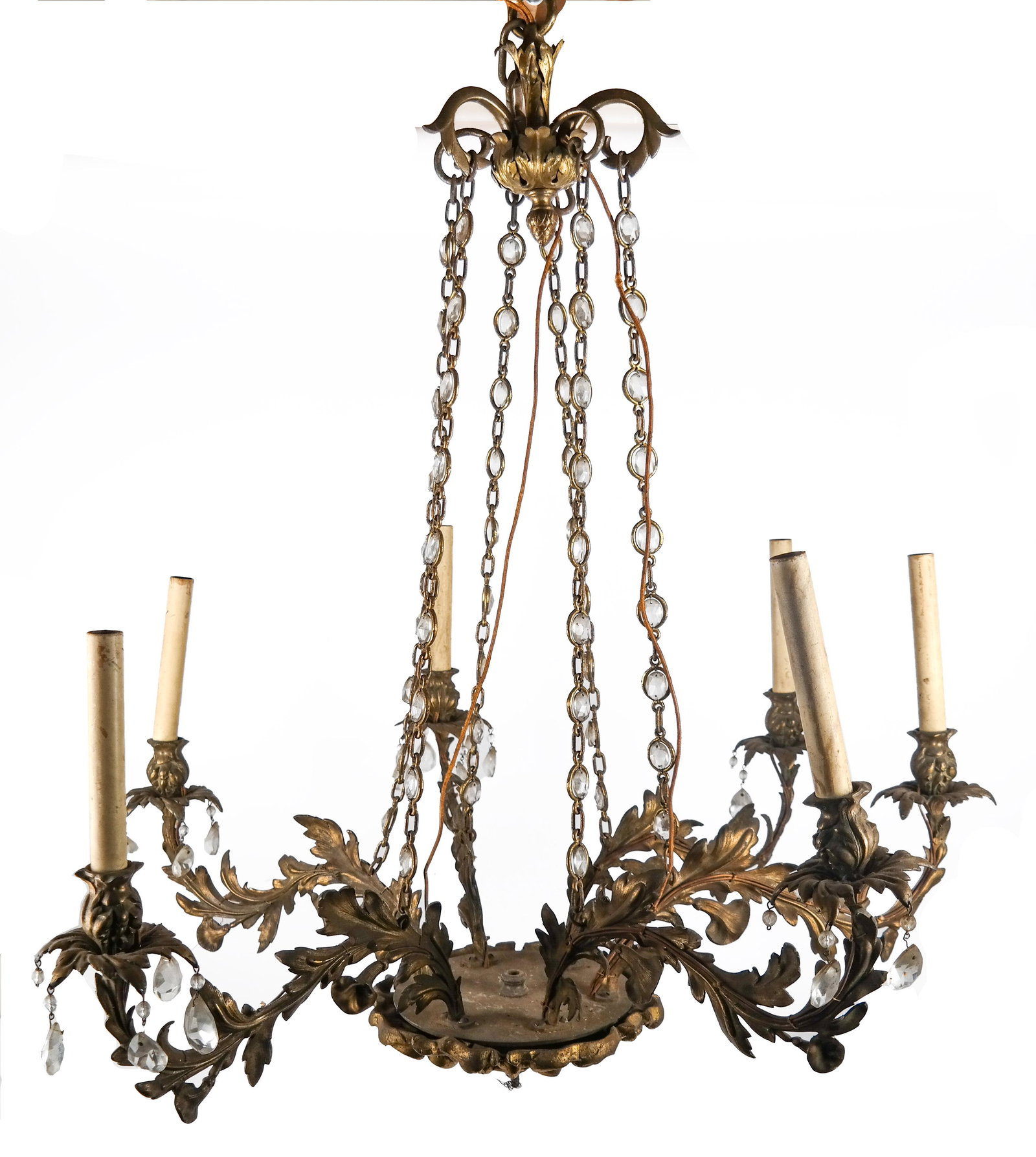 Rococo Crystal & Bronze Chandelier: Rococo ornate brass or bronze frame with crystal drops and crystal and brass support chains. [27-inch drop; 30 inches across arms]. Frame in good condition; some bobeches missing crystals.