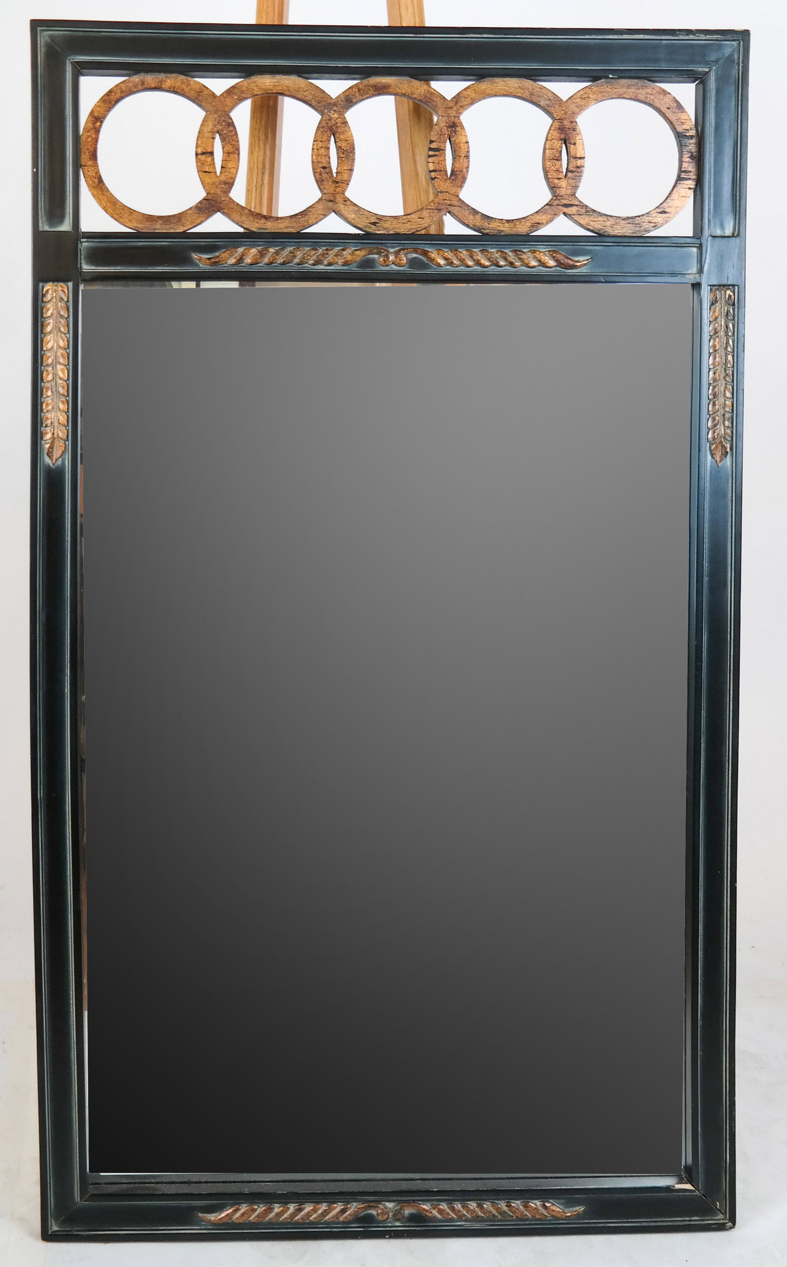 Wall Mirror in Manner of James Mont: Black and silver mirror, int he manner of James Mont. [49 x 28 1/2 inches]. Wear to paint.