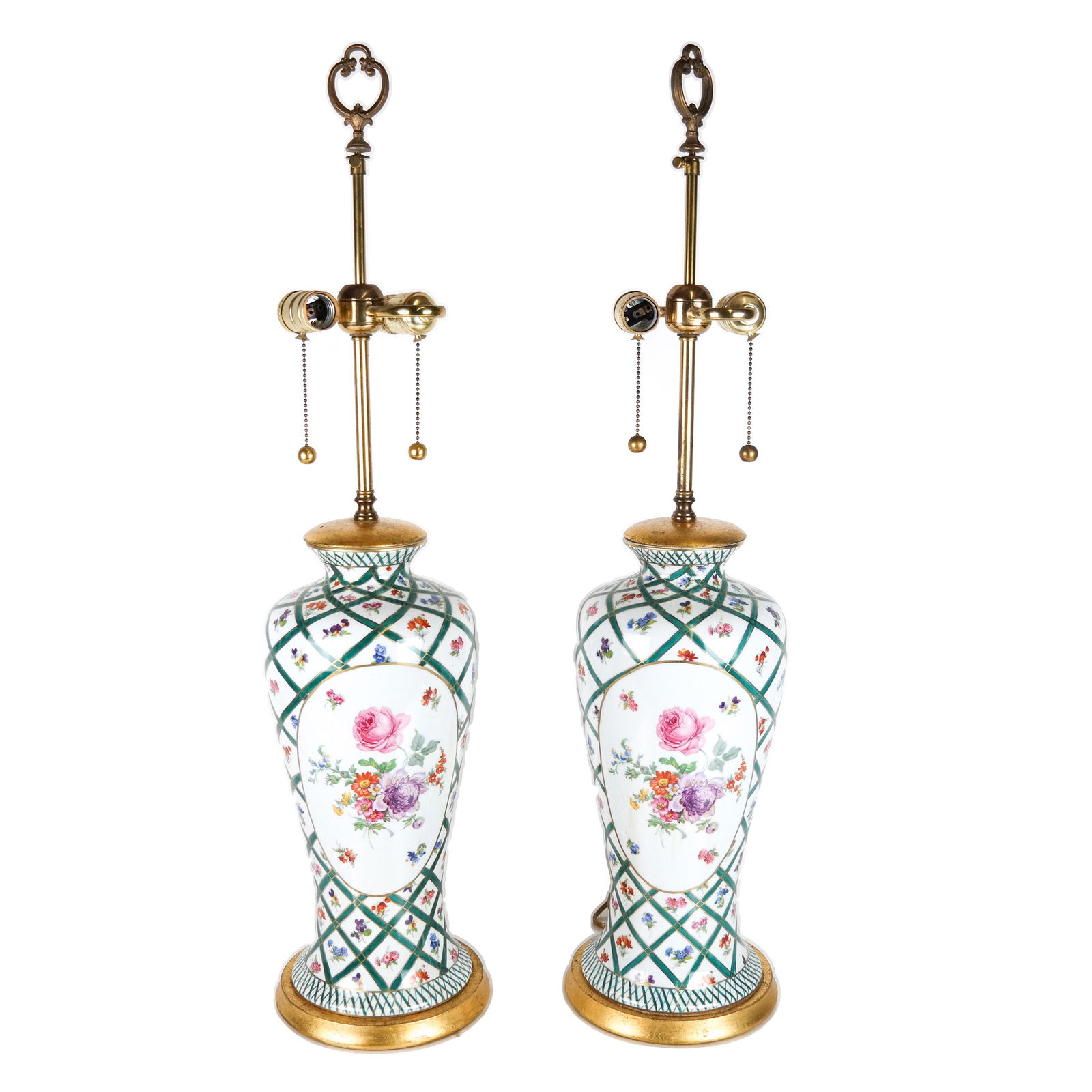 Pair Frederick Cooper Porcelain Lamps: Pair of floral decorated lamps, each with gilt base and top. [32 inches high]. In good condition.