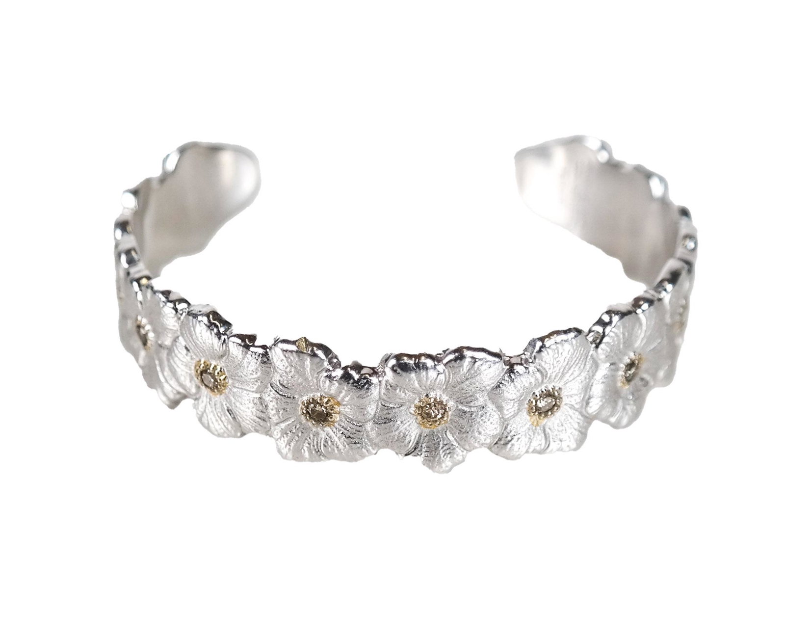 Buccellati Gold, Silver & Diamond Cuff Bracelet: Buccellati, Italy sterling silver and yellow gold bracelet with diamonds. 26.9 dwt. inclusive. Measures 6 inches across opening.